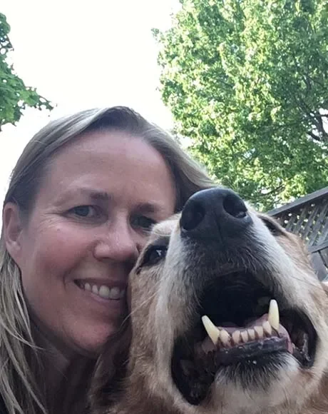 Sue McDermid with one of Riverway's dogs - Riverway Therapy, North Bay
