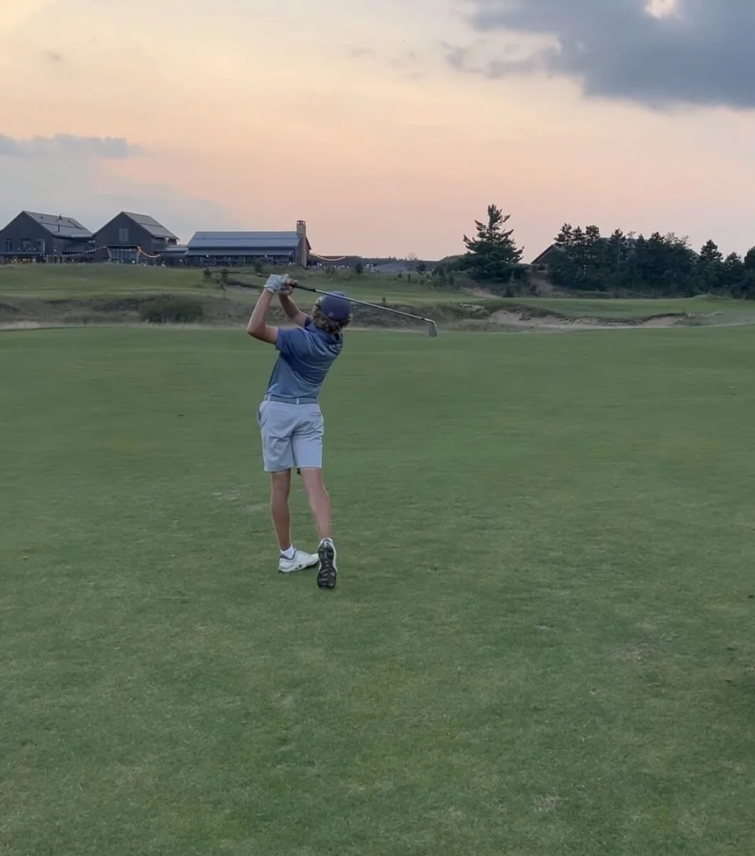 Luke Prunty competing on the golf course