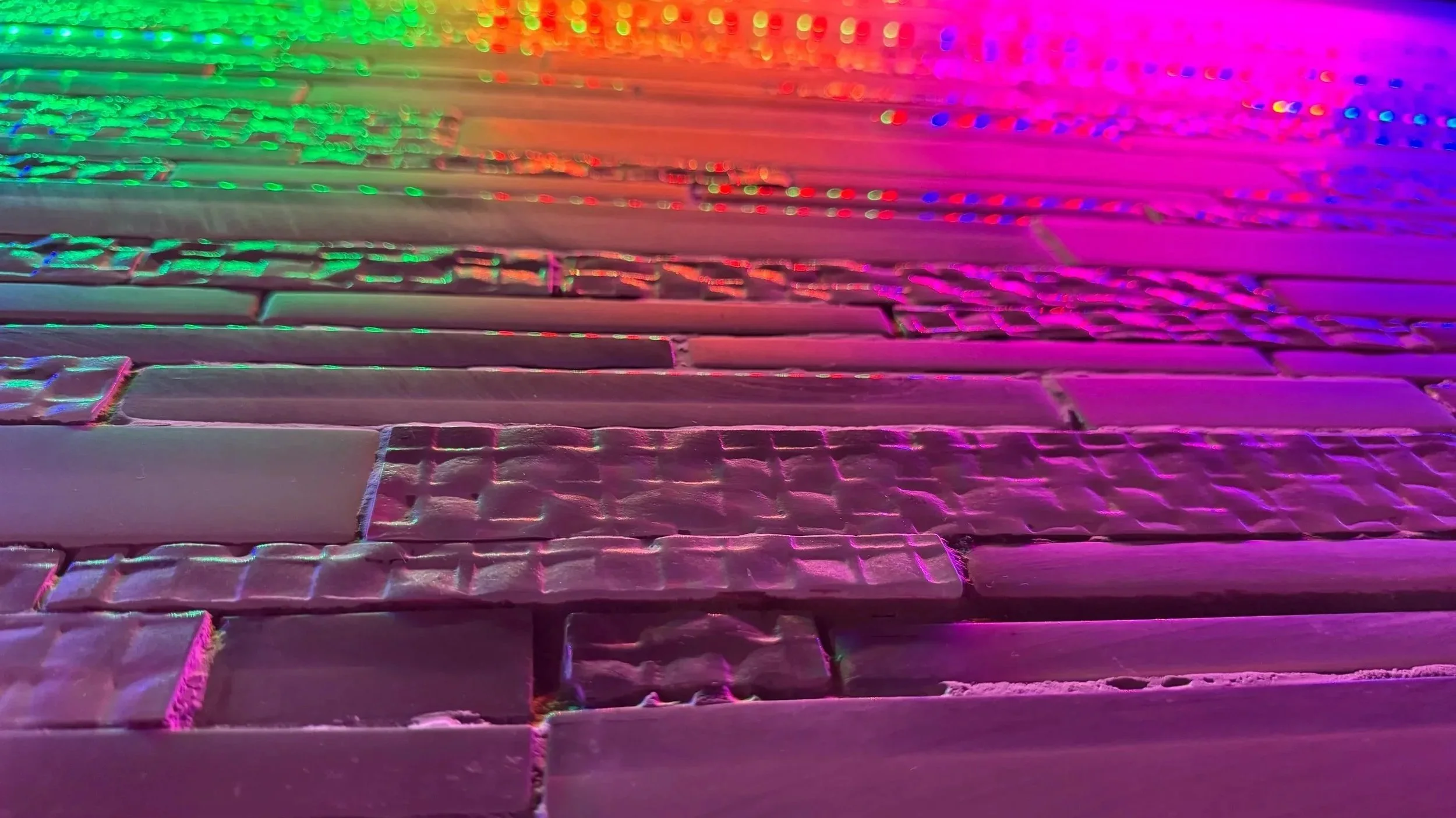 Close up of tile wall at QBar
