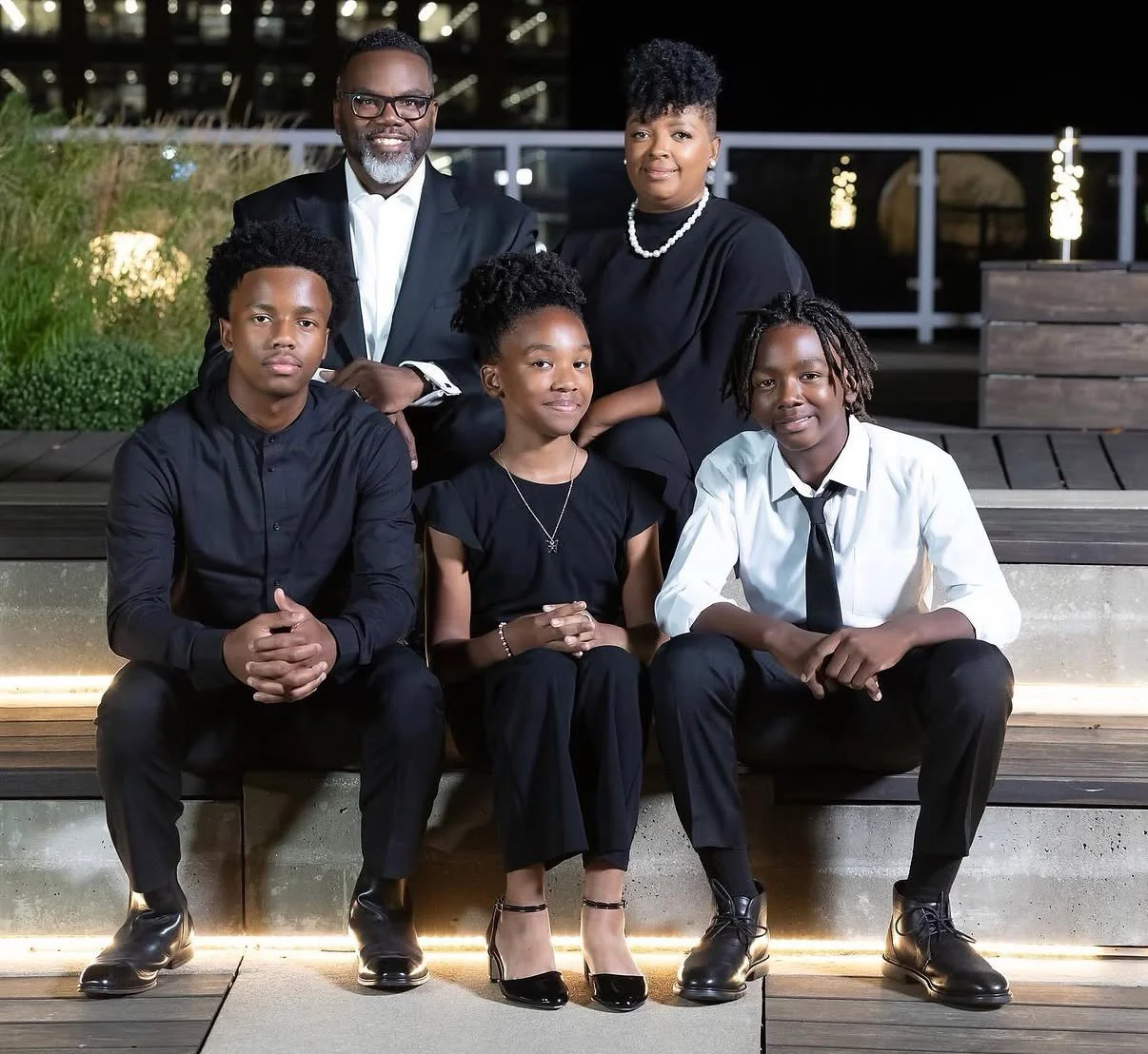 Photo of Chicago Mayor Brandon Johnson, who is running for reelection, with his family