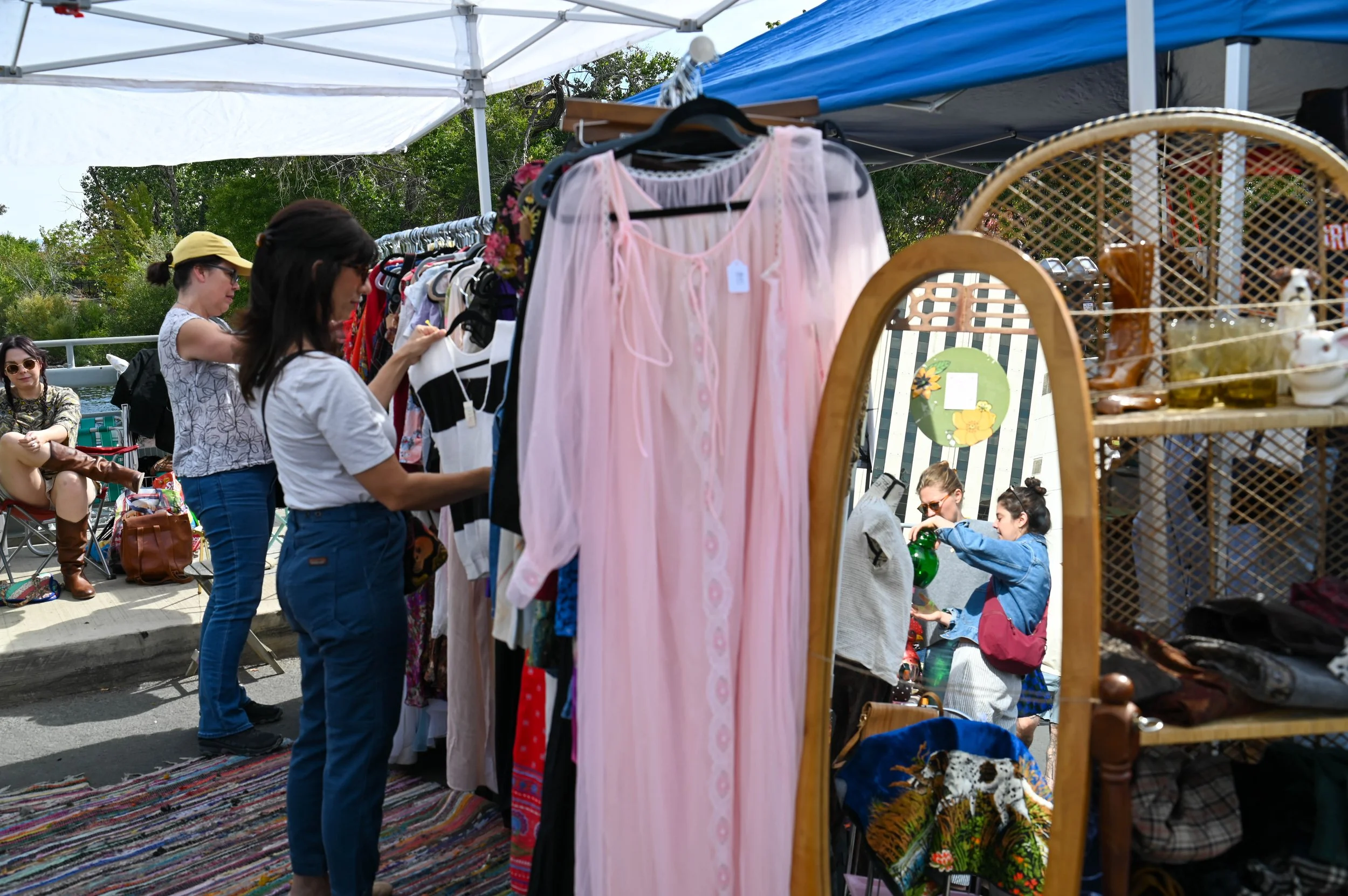 While some visitors came looking for antiques and collectibles, others stopped at racks of vintage clothing, searching for older styles that still feel wearable today.