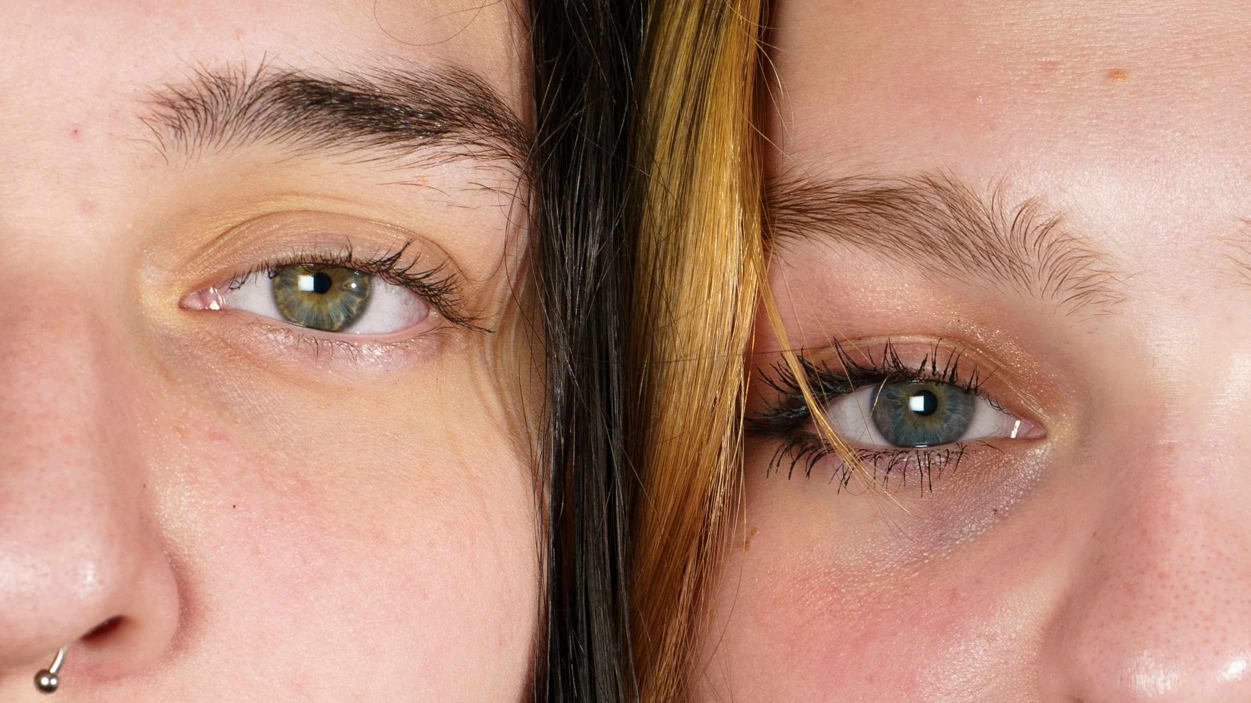 A detail image of the eyes of Madi (left) and Alicia (right) Gentes at Rochester Institute of Technology on Apr. 21, 2025 in Rochester, N.Y.