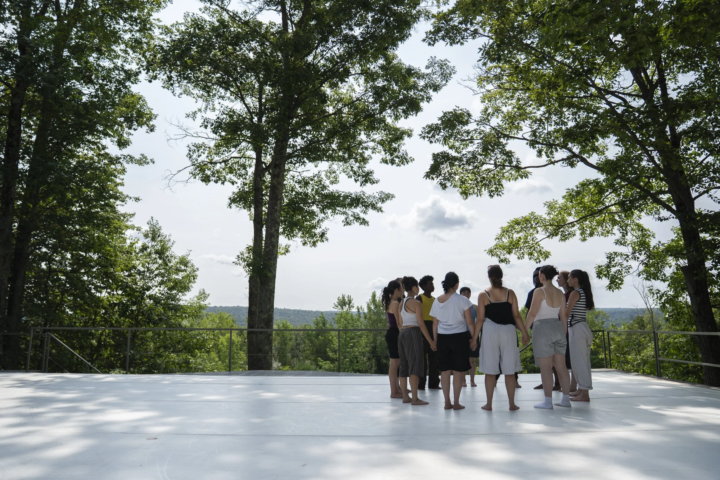 Interns do their pre-show ritual on the Henry J. Leir Stage before presenting and performing in The PillowCase on Aug. 10, 2026.