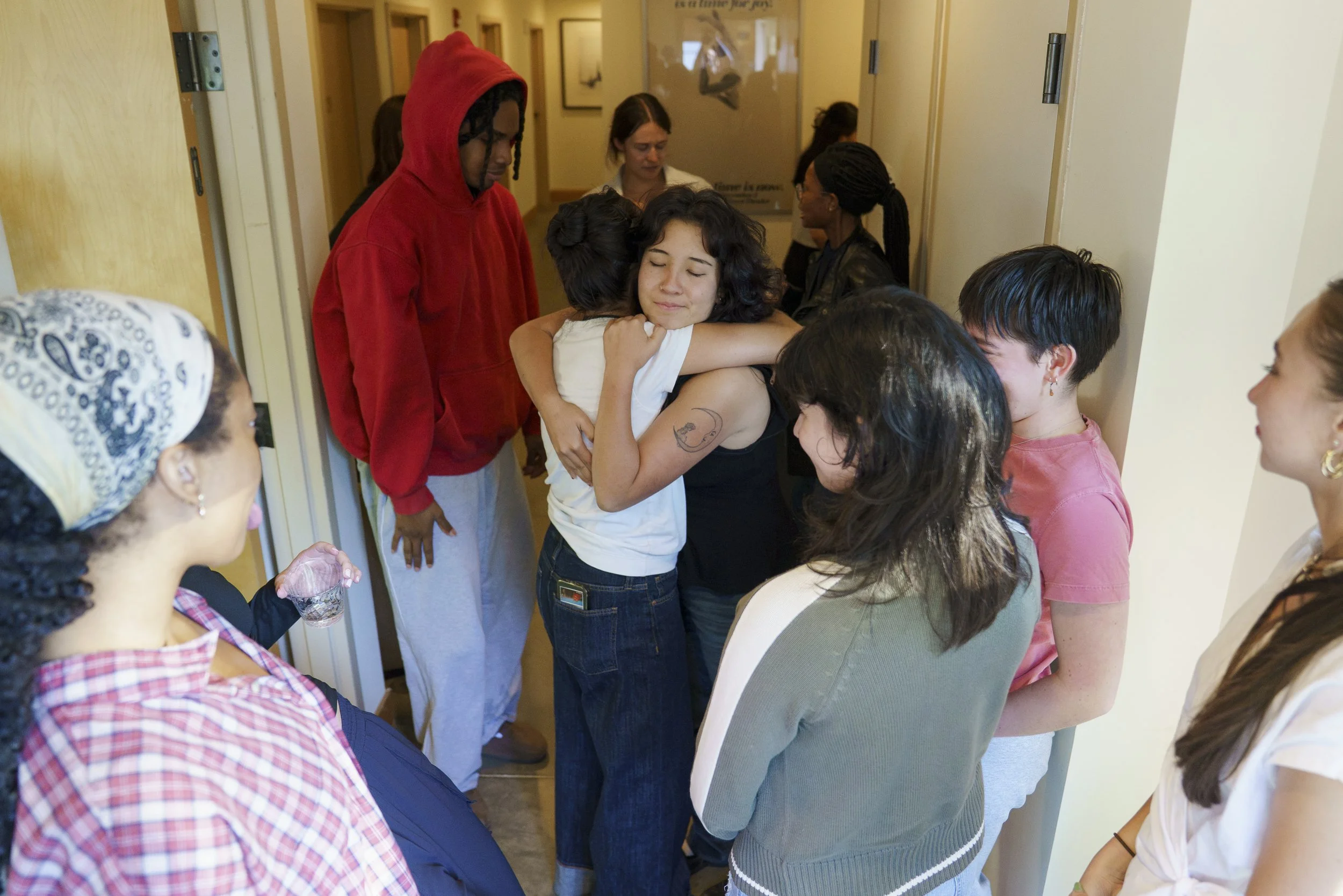 Tamarah Minami (tattoo) hugs Shaye Hazen before she leaves to return to college at the end of her internship on Aug. 28, 2026.