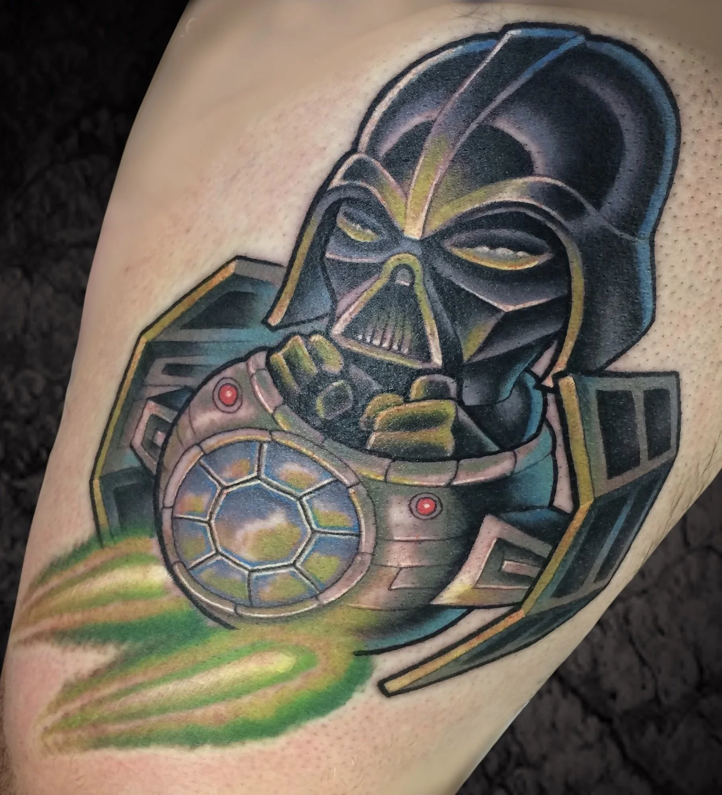 Tattoo of Darth Vader wearing a space suit, holding a lightsaber, with a spaceship and galaxy background.