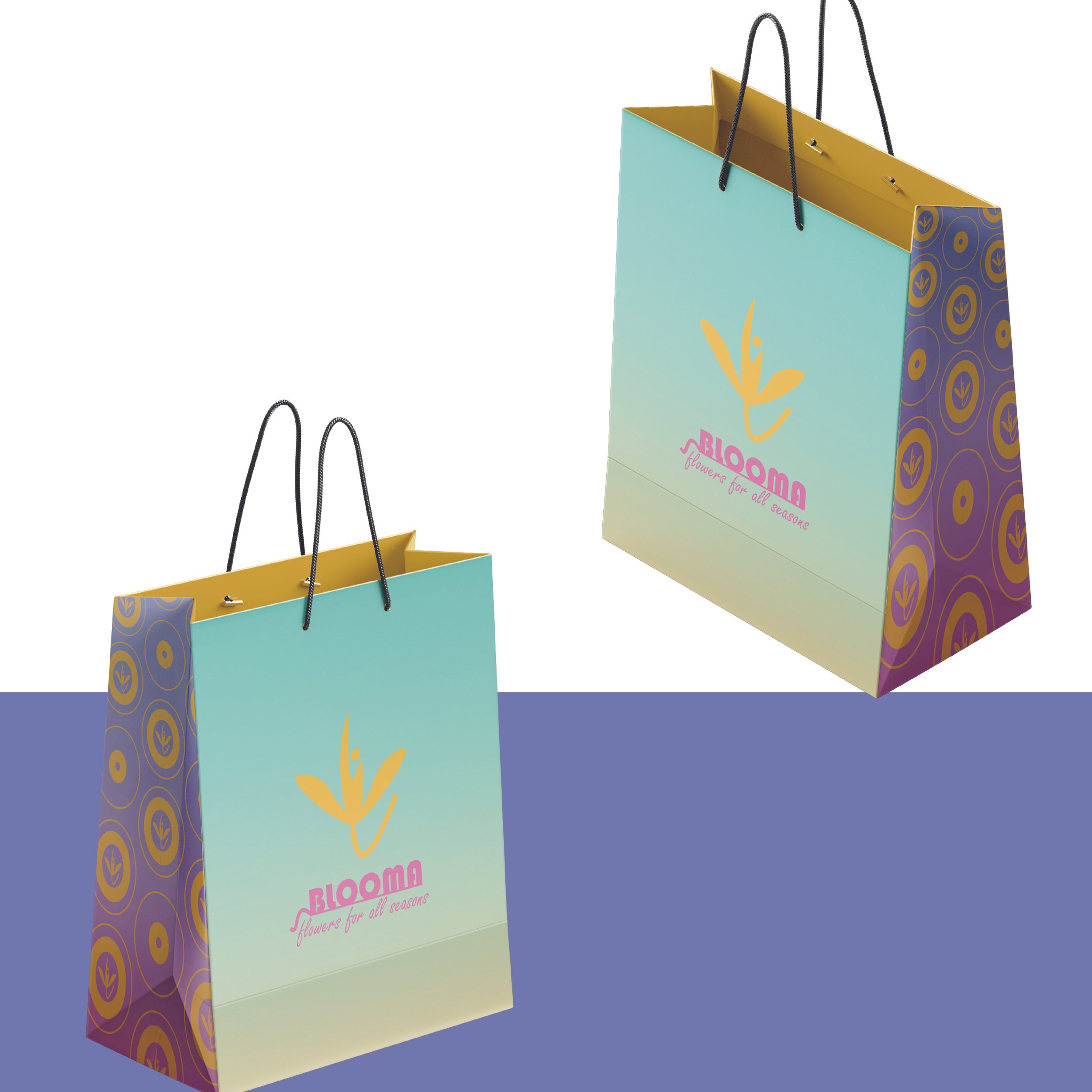 Colorful shopping bags with black handles, one large bag with floral design and the words 'Bloom Flowers for All Seasons', and one smaller bag with a teal and purple color scheme.