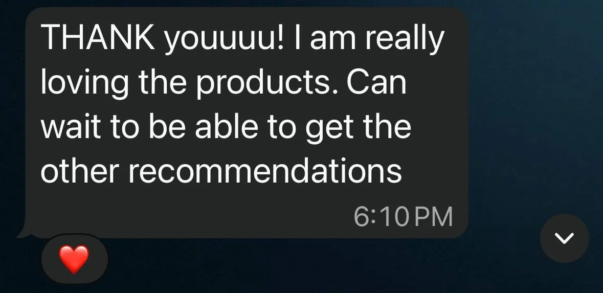 Text message on a dark background expressing gratitude and excitement about products, with a heart emoji at the bottom.