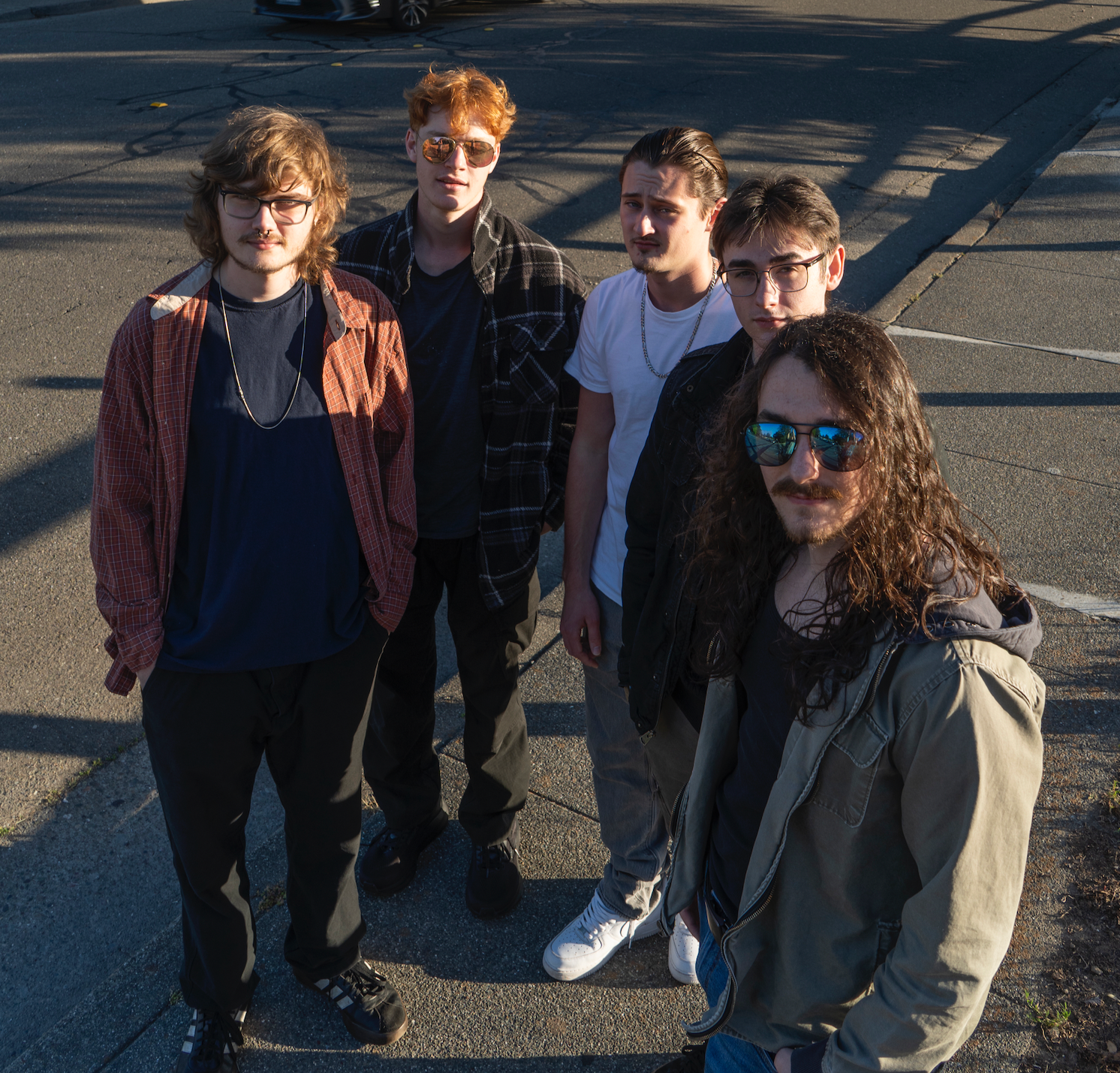 basilisk-band-group-photo-parking-lot.png