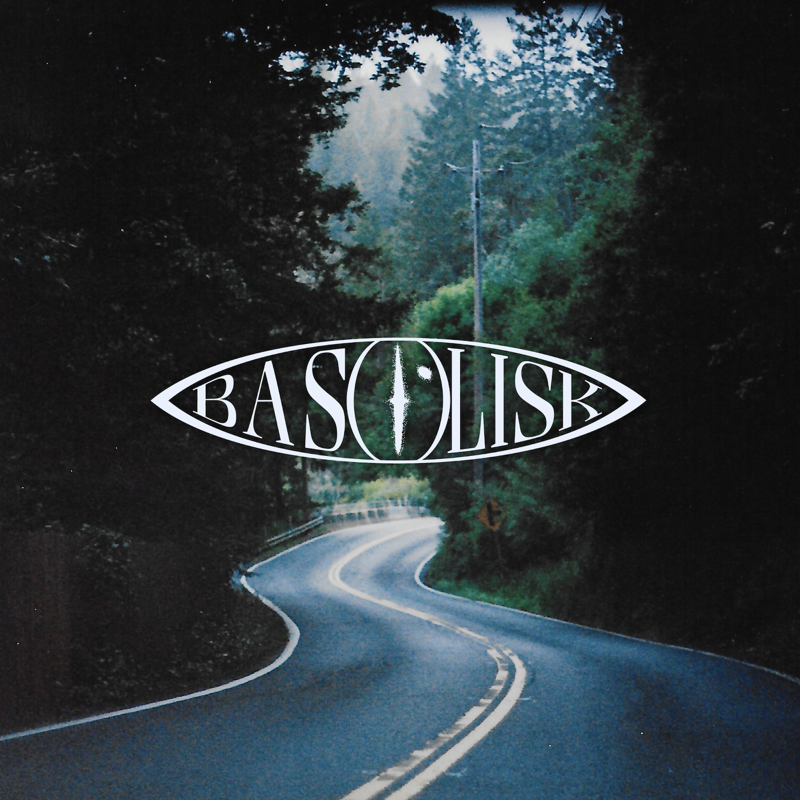 The album cover for "Calistoga" by the band Basilisk, with a film photo of Calistoga Road in Sonoma County, California with the band logo overlayed in right