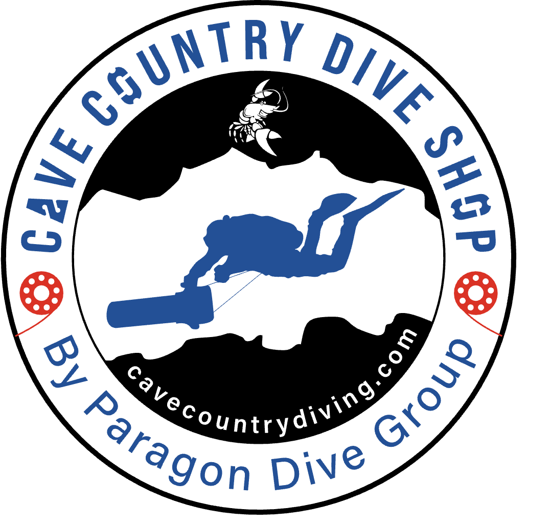 Cave Country Dive Shop by Paragon Dive Group logo featuring a scuba diver silhouette on a DPV over a cave landscape