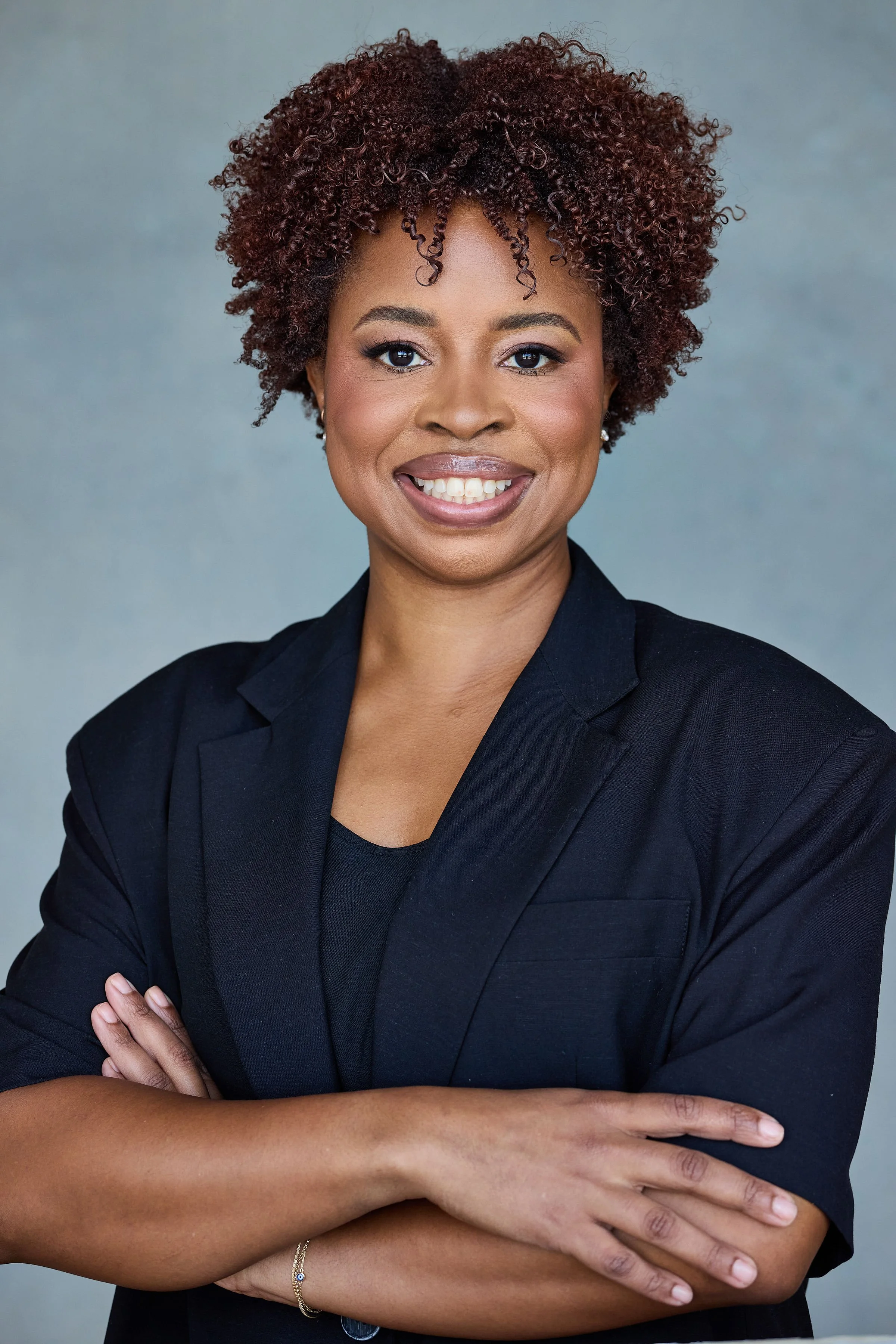 Color photograph of Courtney Browne in black blazer