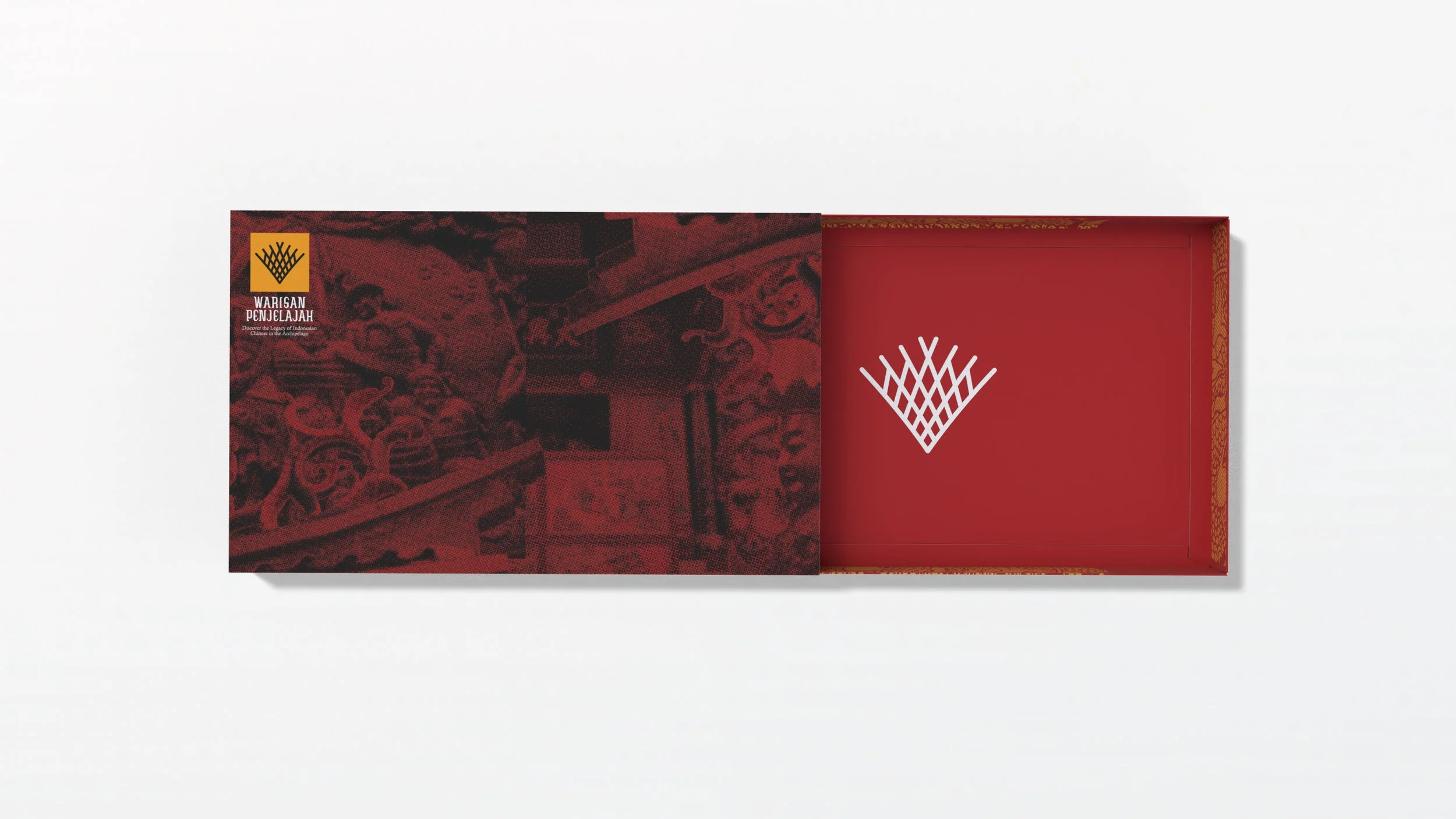 Red Warisan Penjelajah board game box featuring a white geometric logo and illustrated graphics on the packaging.