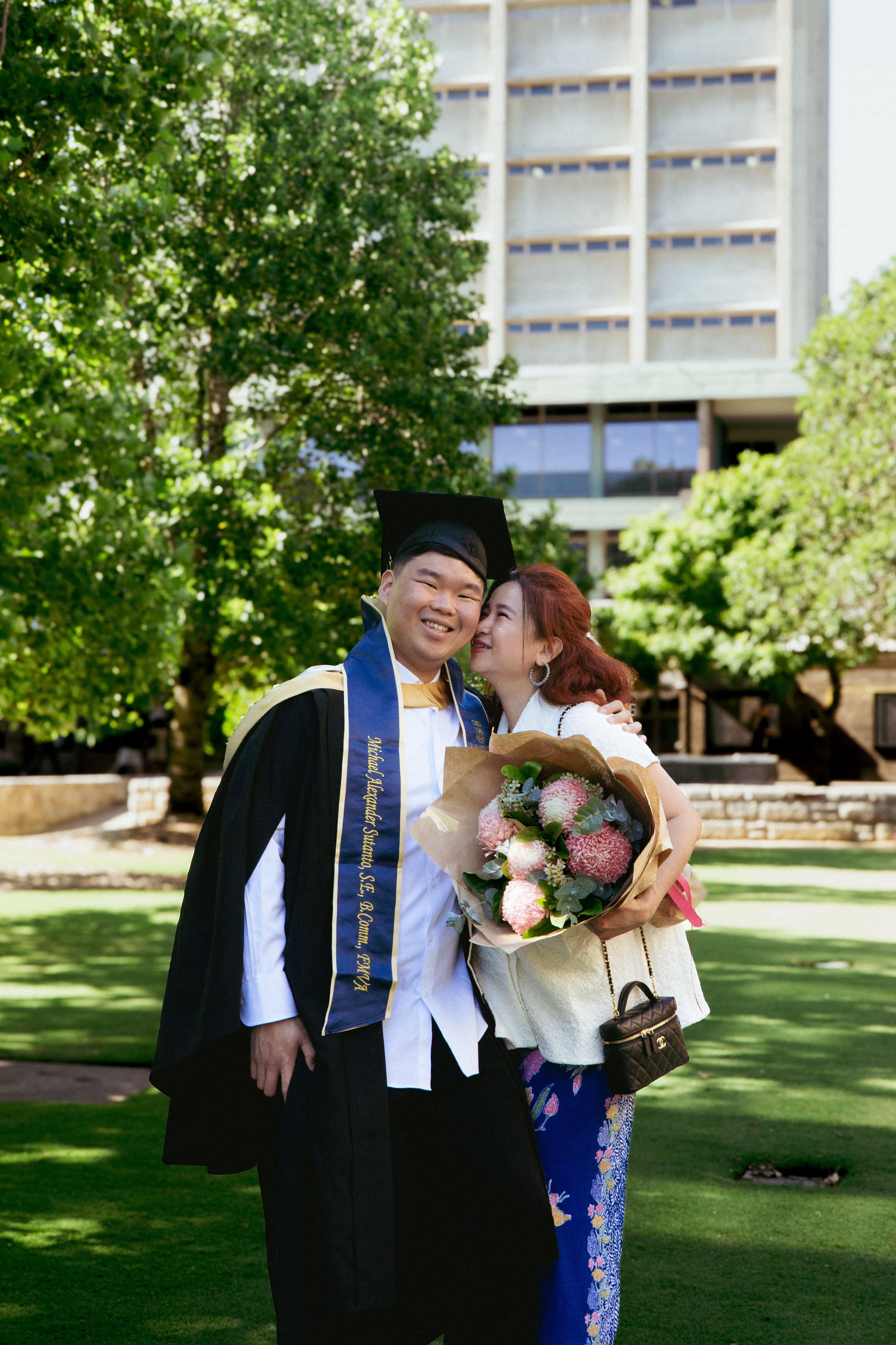 unsw-graduation-portrait-photography-library-lawn-michael-mother-nathanael-jason.jpg