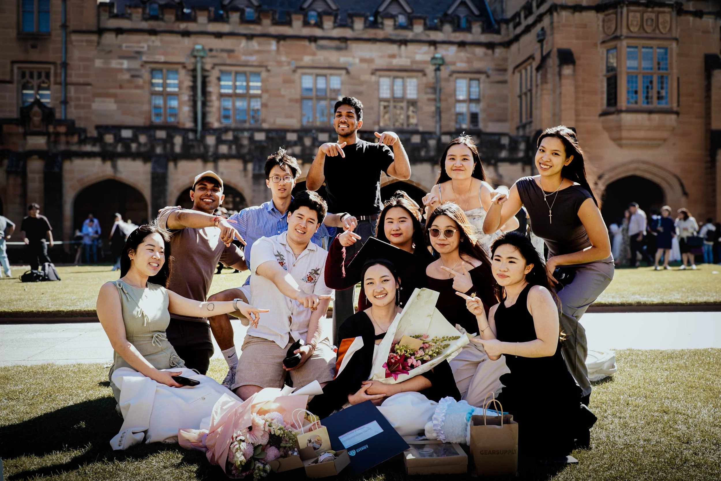 usyd-graduation-portrait-photography-quad-lawn-beatrice-friends-nathanael-jason.jpg