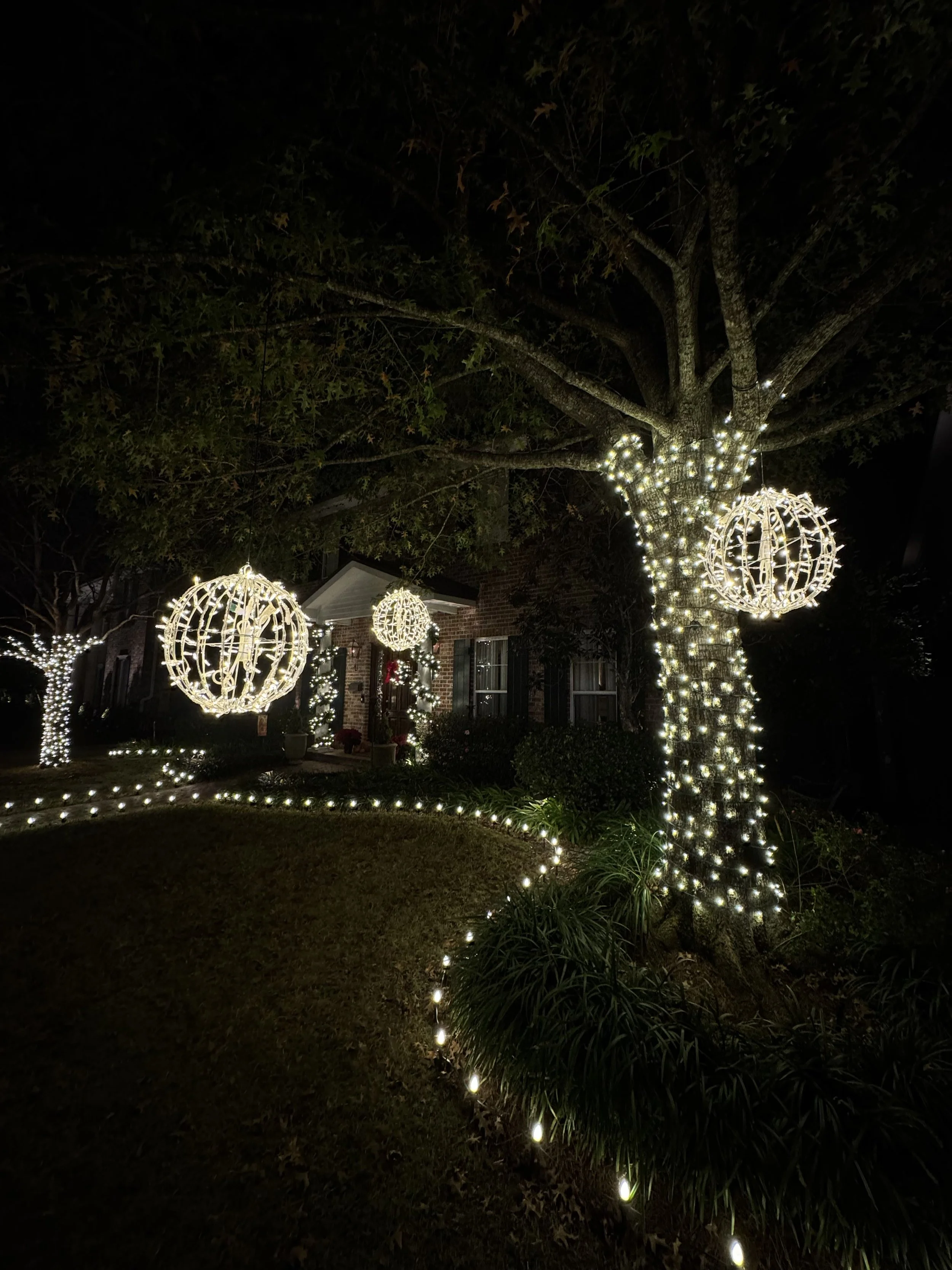 white-christmas-lights-tree-hanging-spheres.jpg