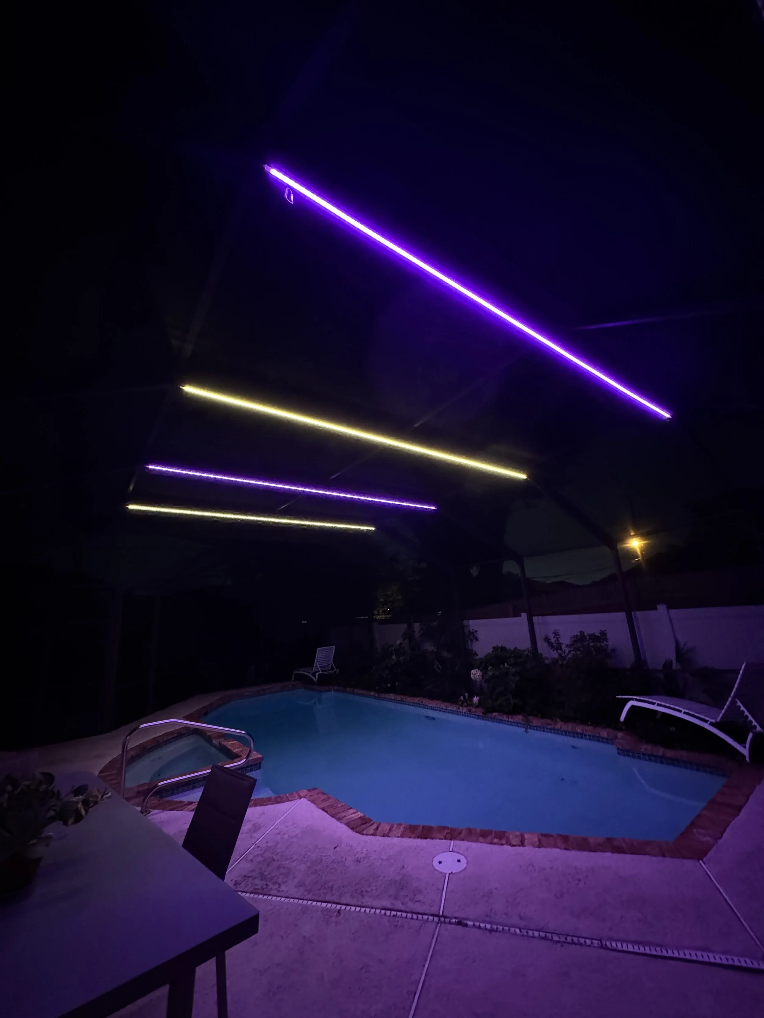 purple-yellow-permanent-led-lights-pool-enclosure.jpg
