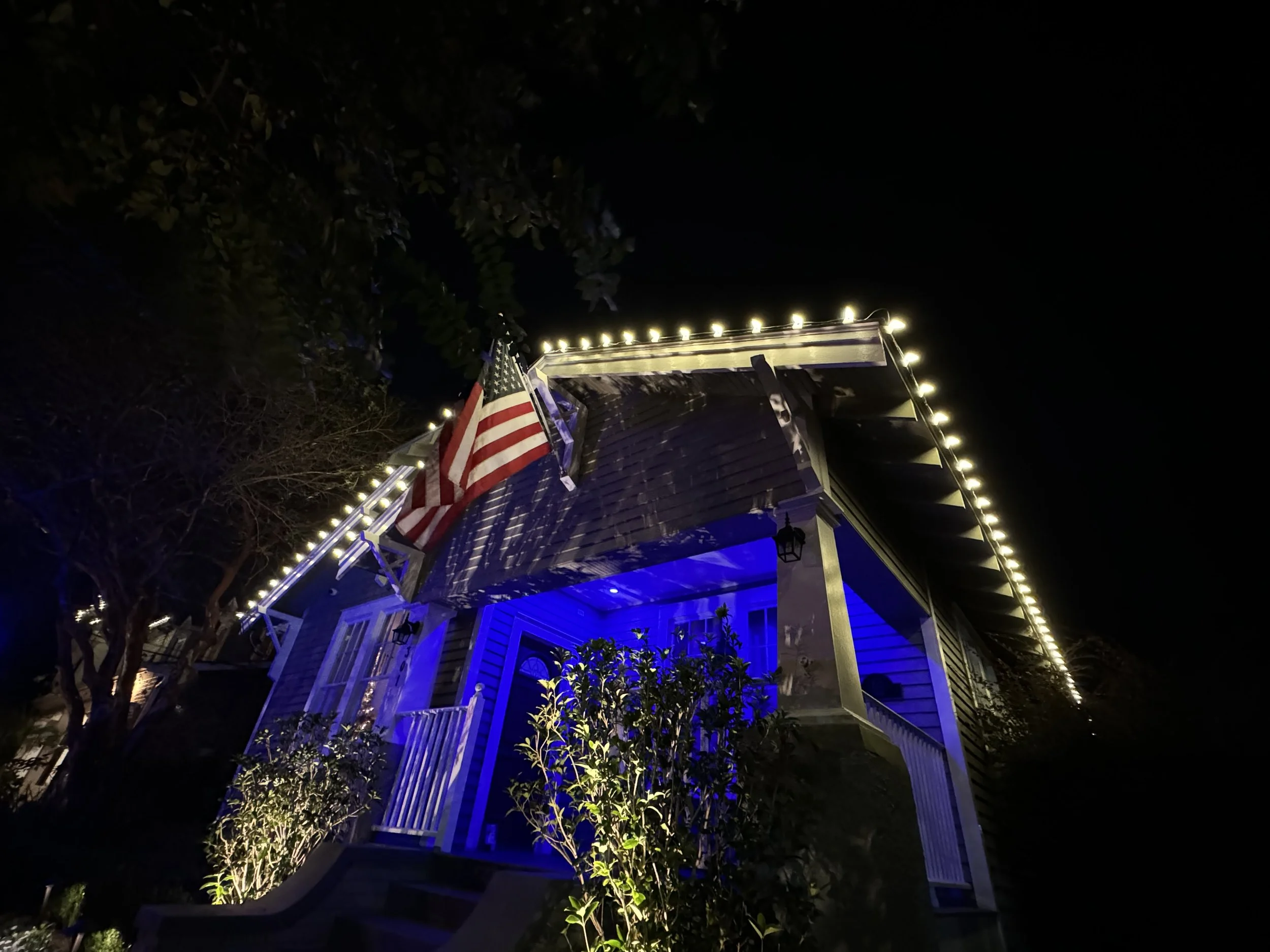 white-christmas-lights-house-blue-porch.jpg
