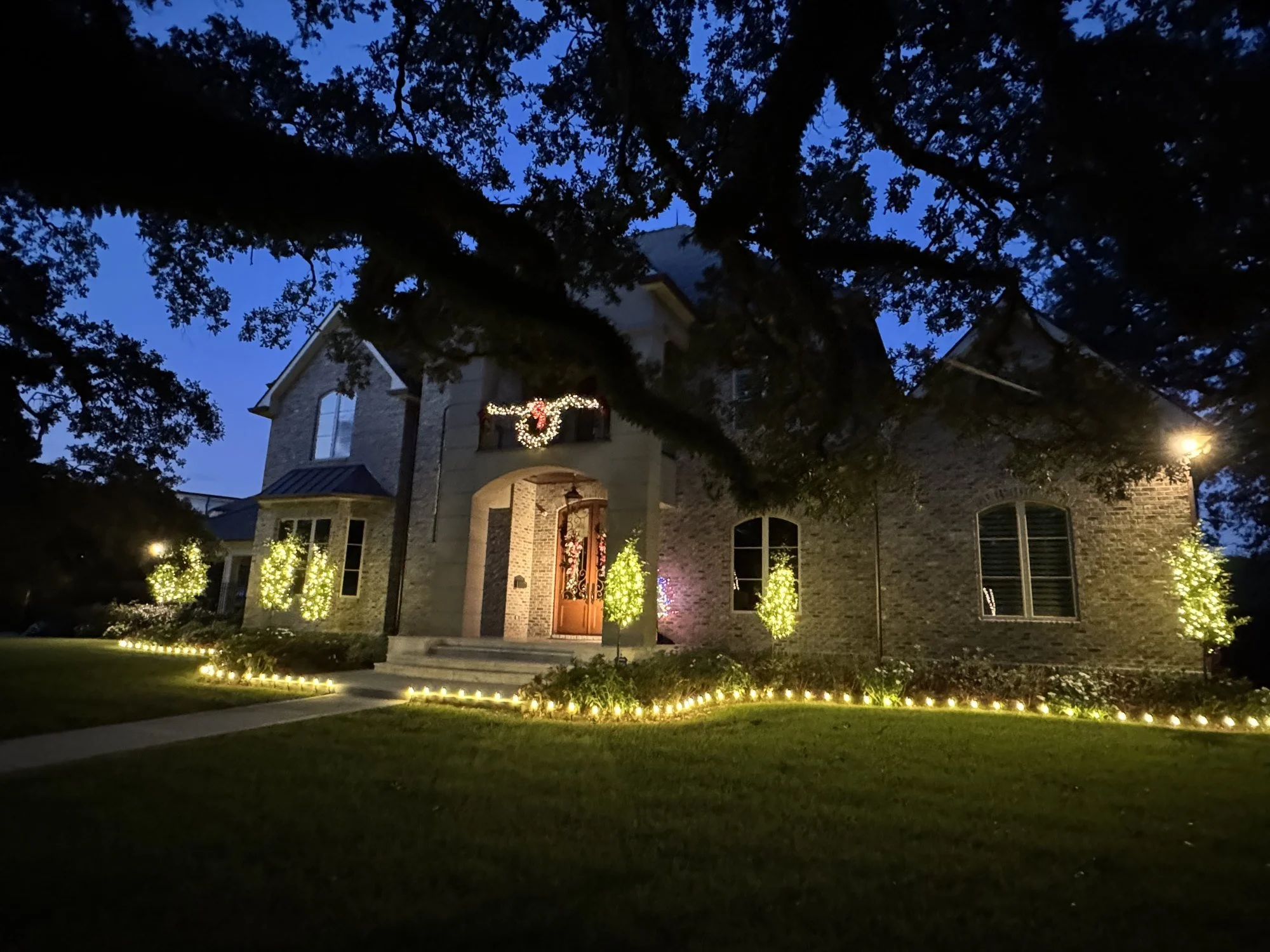 warm-white-christmas-lights-home-at-dusk.jpg