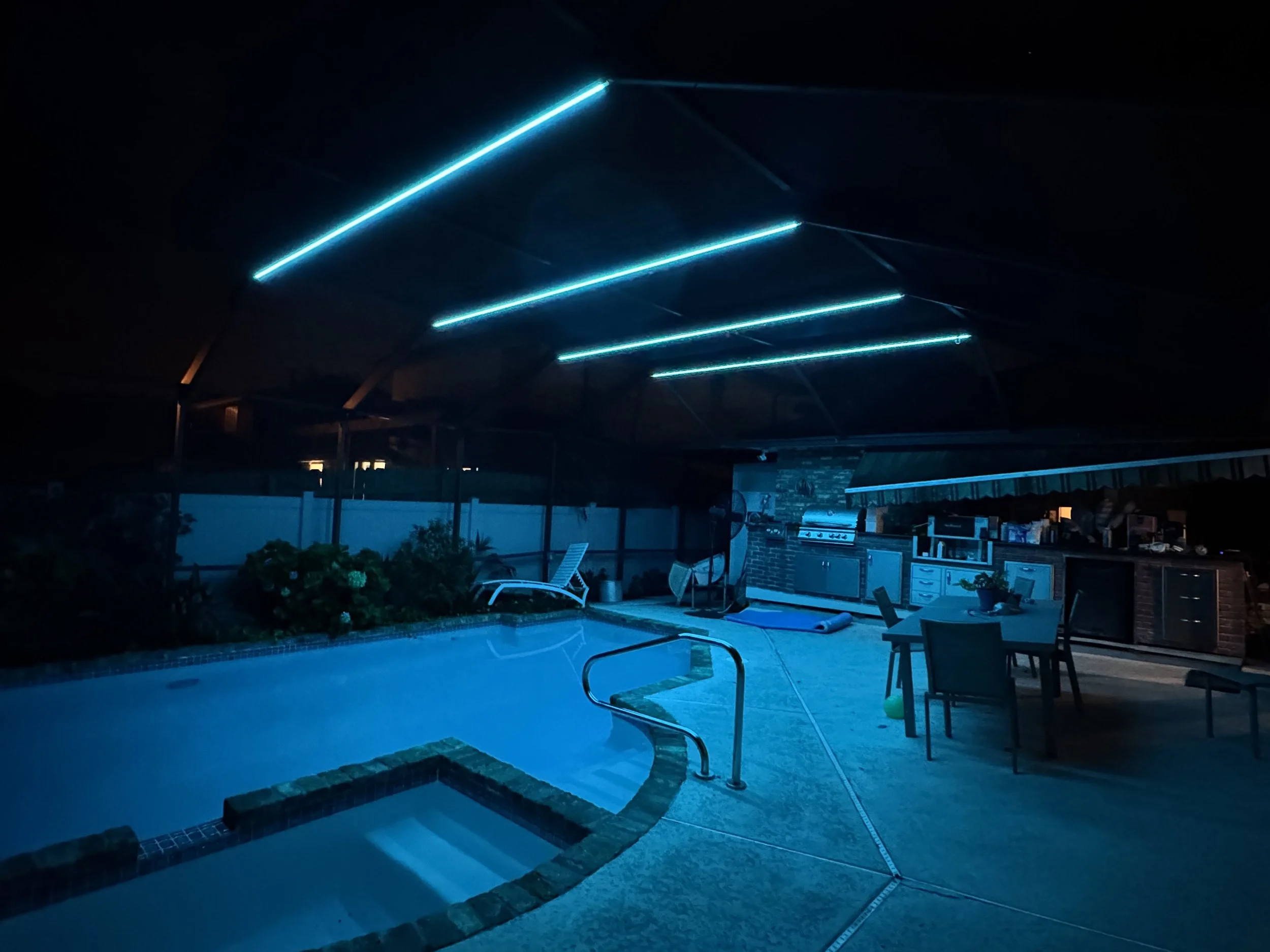 blue-permanent-led-lights-pool-enclosure.jpg