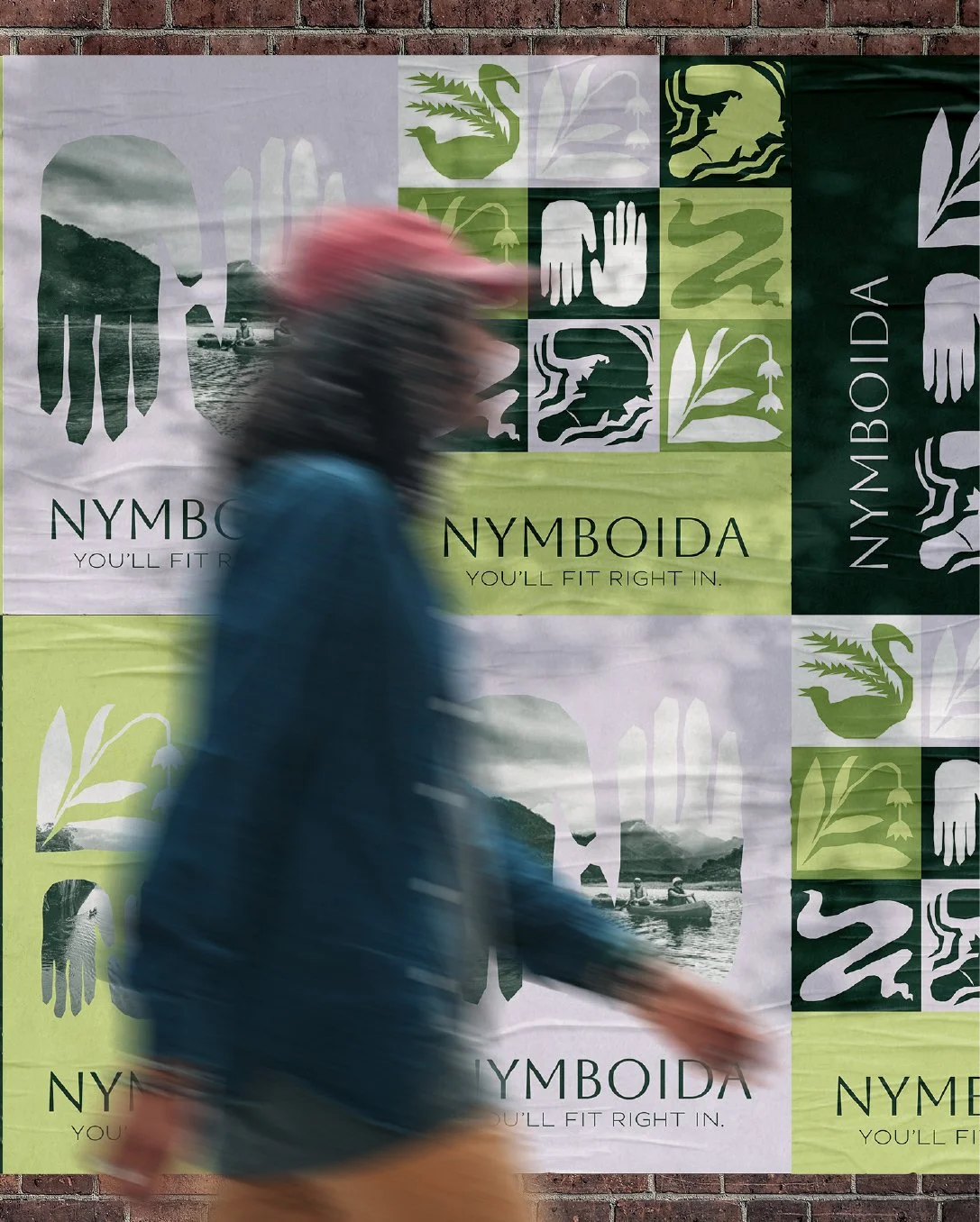 Blurred person walking past a wall covered with Nymoida campaign posters featuring logos, graphics of hands, swans, and nature scenes, and the slogan 'You'll fit right in.'