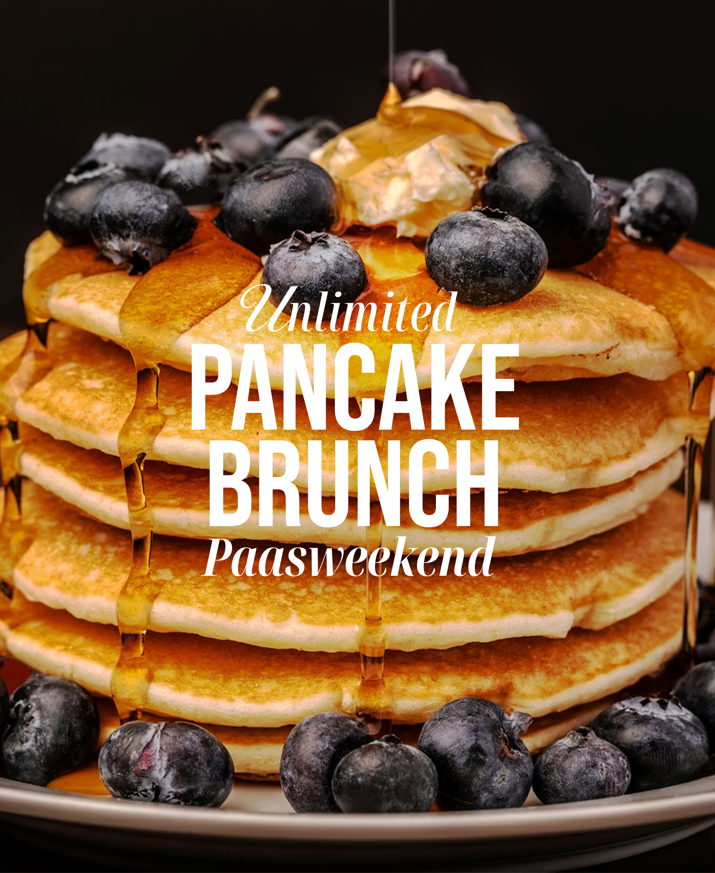 Stacked pancakes topped with blueberries and syrup, with the words 'Unlimited pancake brunch Paasweekend' overlaid.