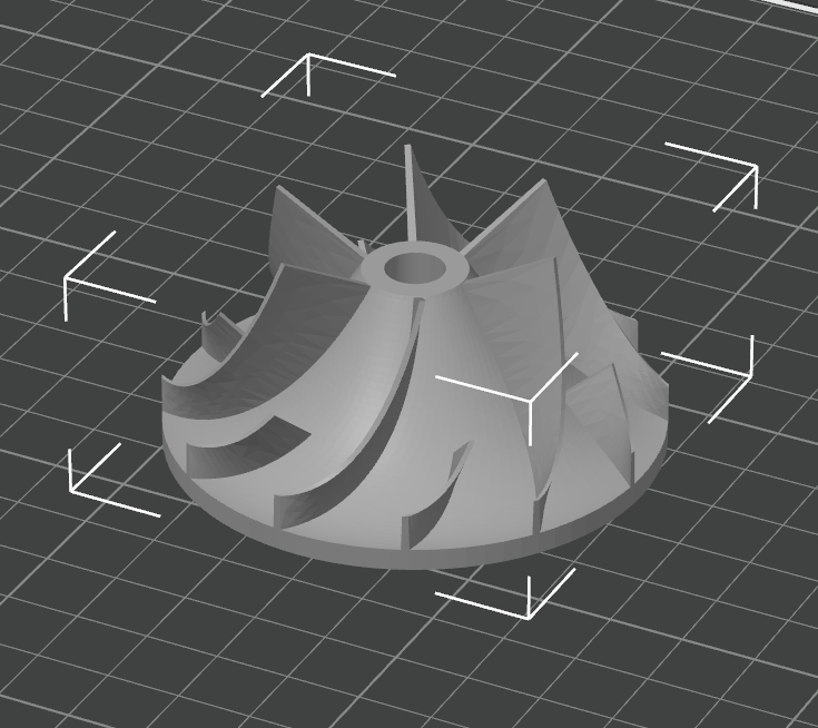 Grey compressor wheel CAD model showing the curved blade geometry.
