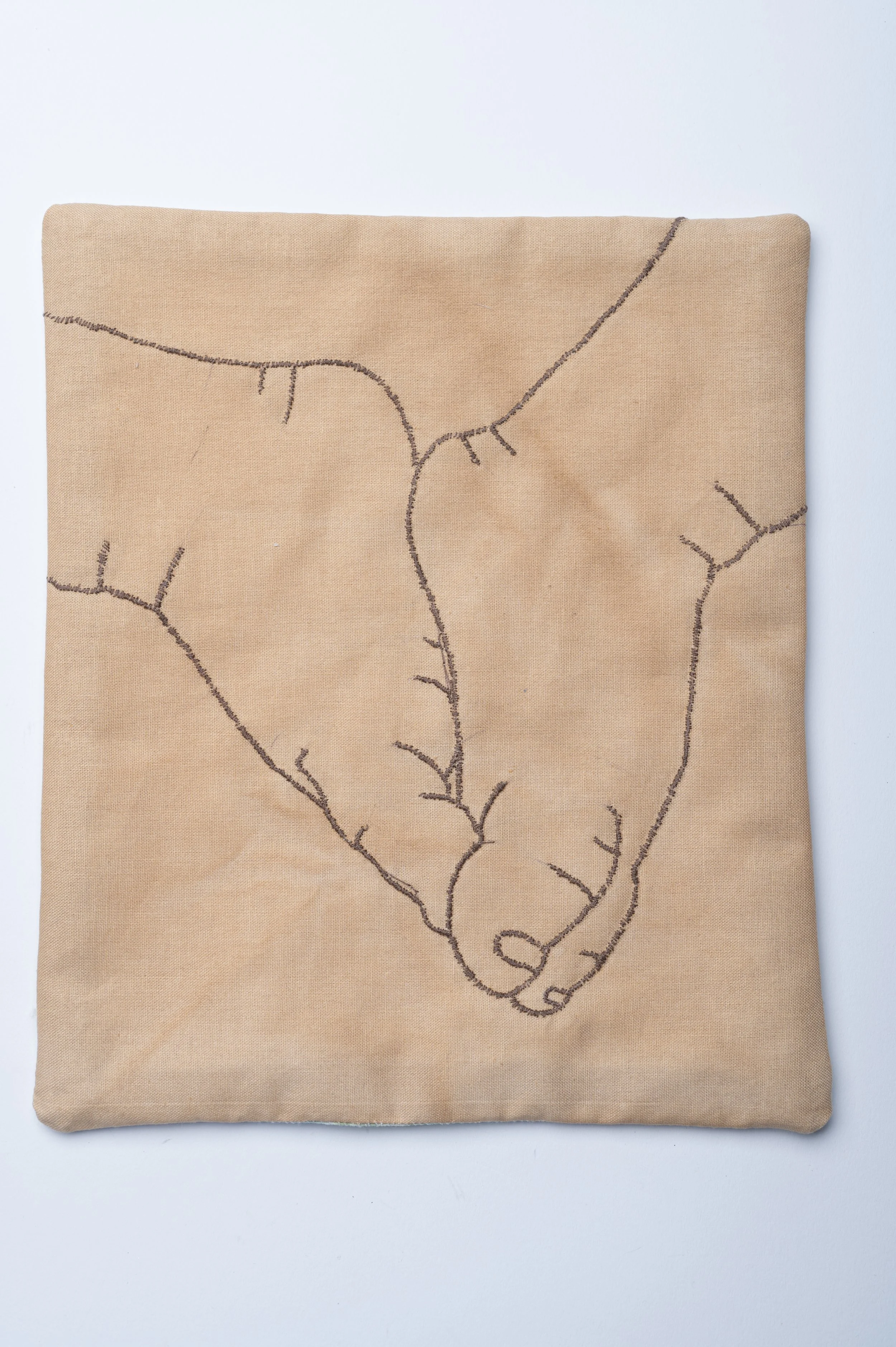 Title - Clasped Feet, 2023, hand embroidery on coffee stained cotton, quilt