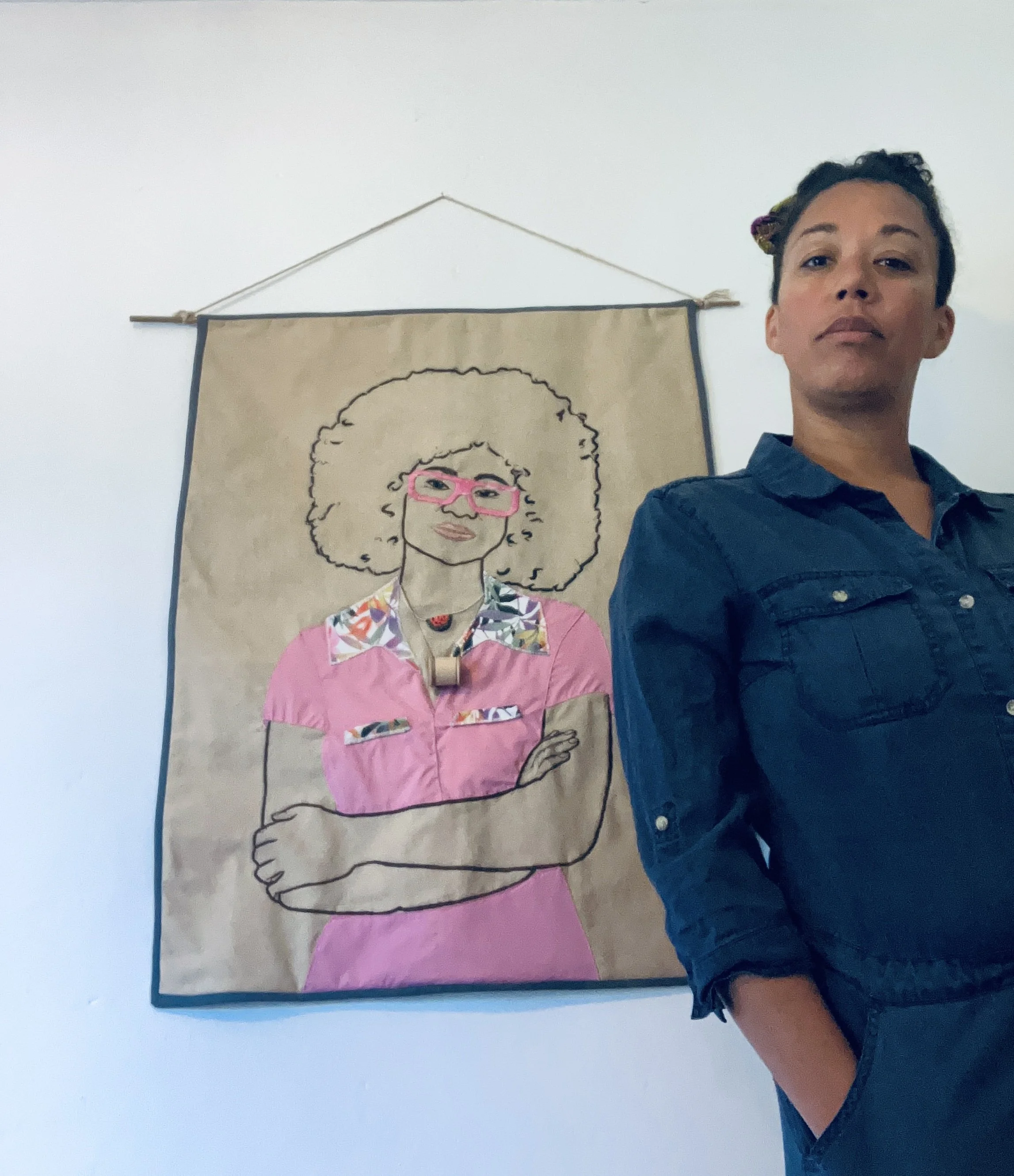 Artist in studio with Soul rebel quilt, 2026