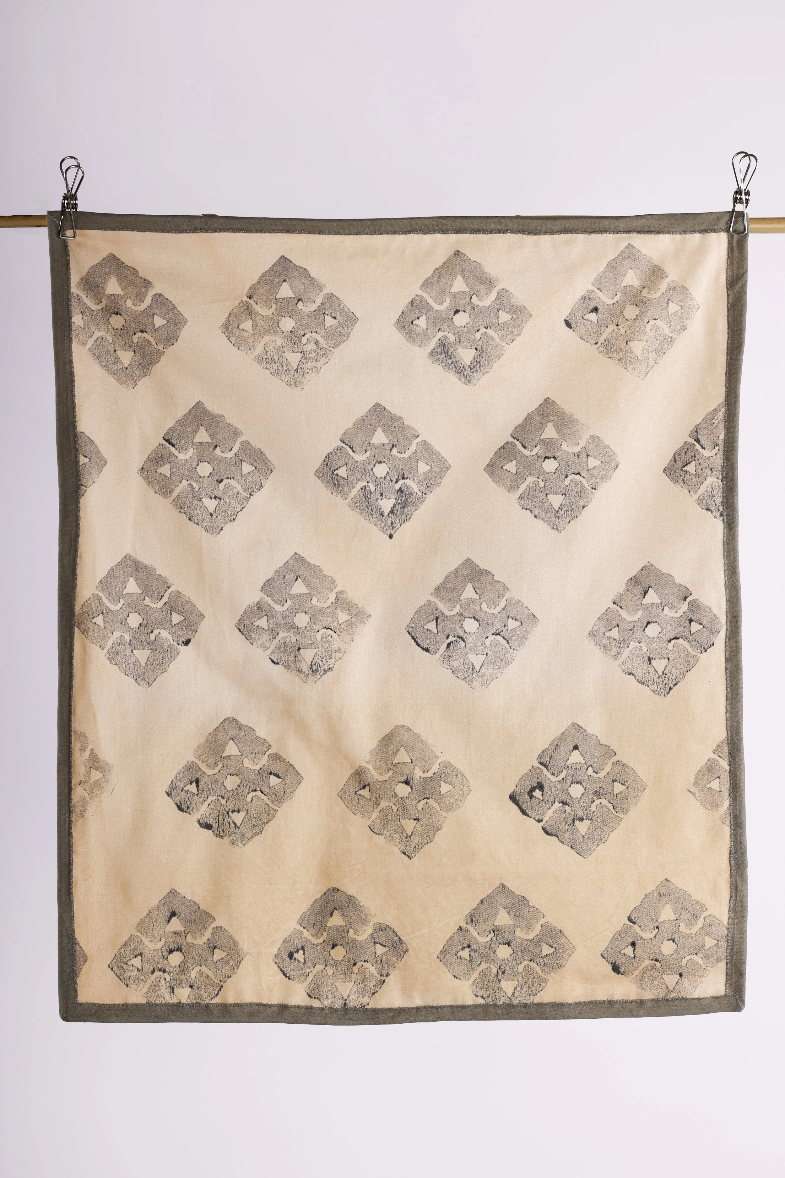 Shattering stereotypes (back), 2025, block print with ink, quilt - 55 x 63cm