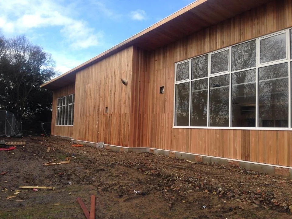 Cedar cladding on a new-build school during construction
