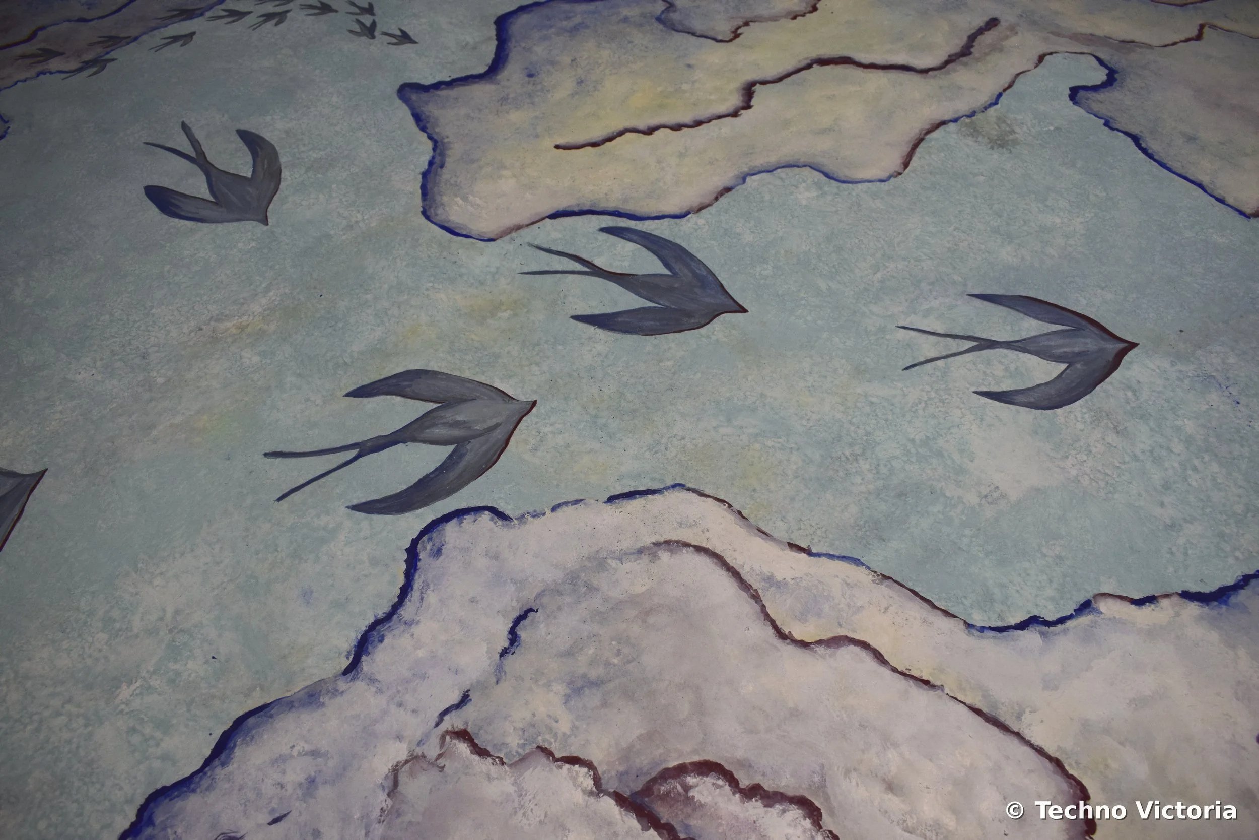 Hand painted fresco using natural pigments, birds fly over an evening sky