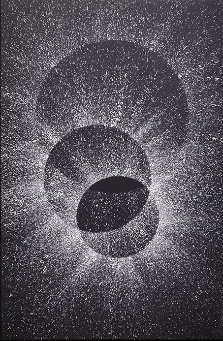 Monochrome abstract space art, original vertical painting featuring three dark celestial spheres layered in a dense white spatter starburst across a black background.