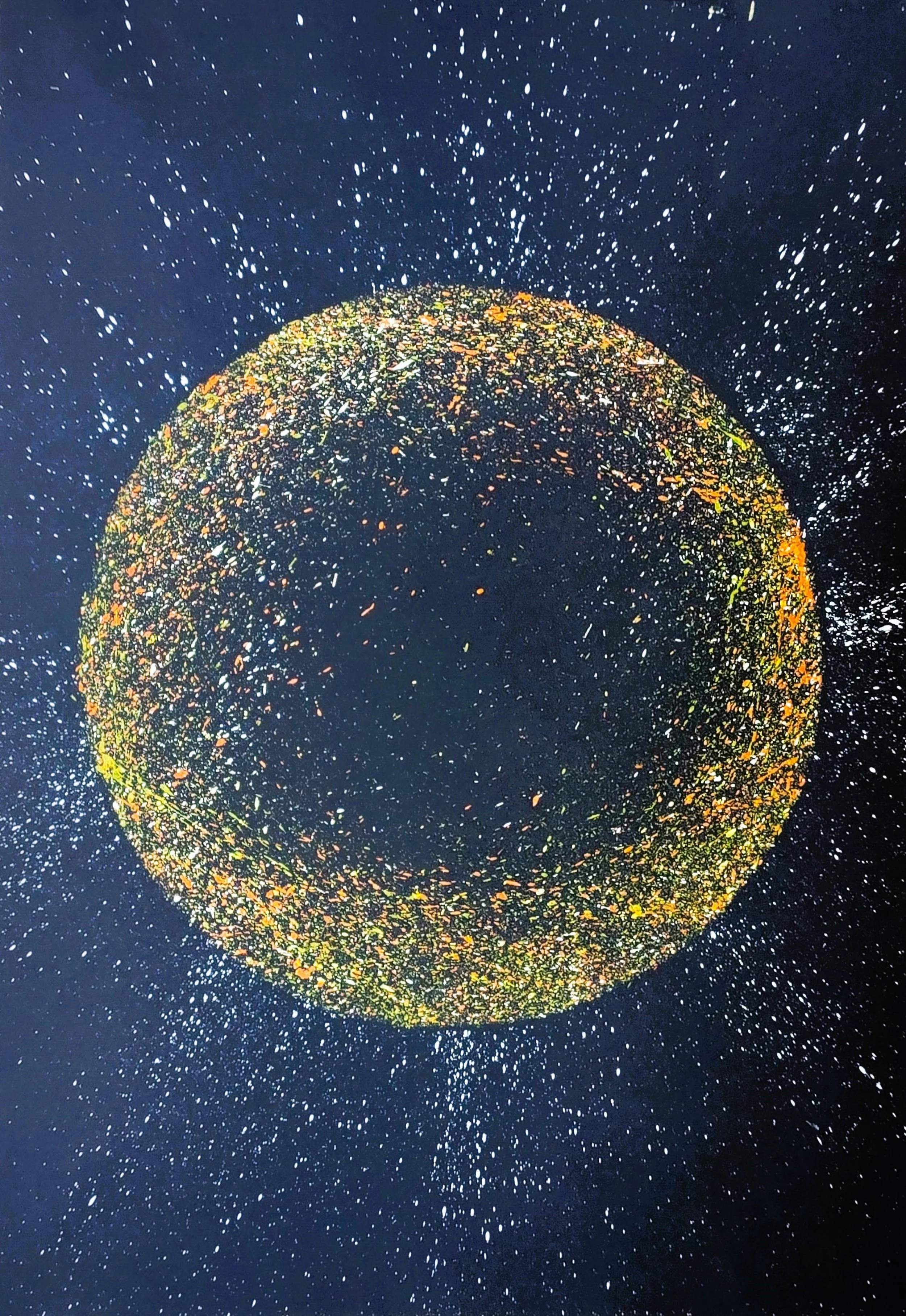 Original vertical abstract painting for sale, featuring a large central sphere formed by dense gold, orange, and green paint spatters, surrounded by a radiant spray of white paint flecks across a dark canvas.