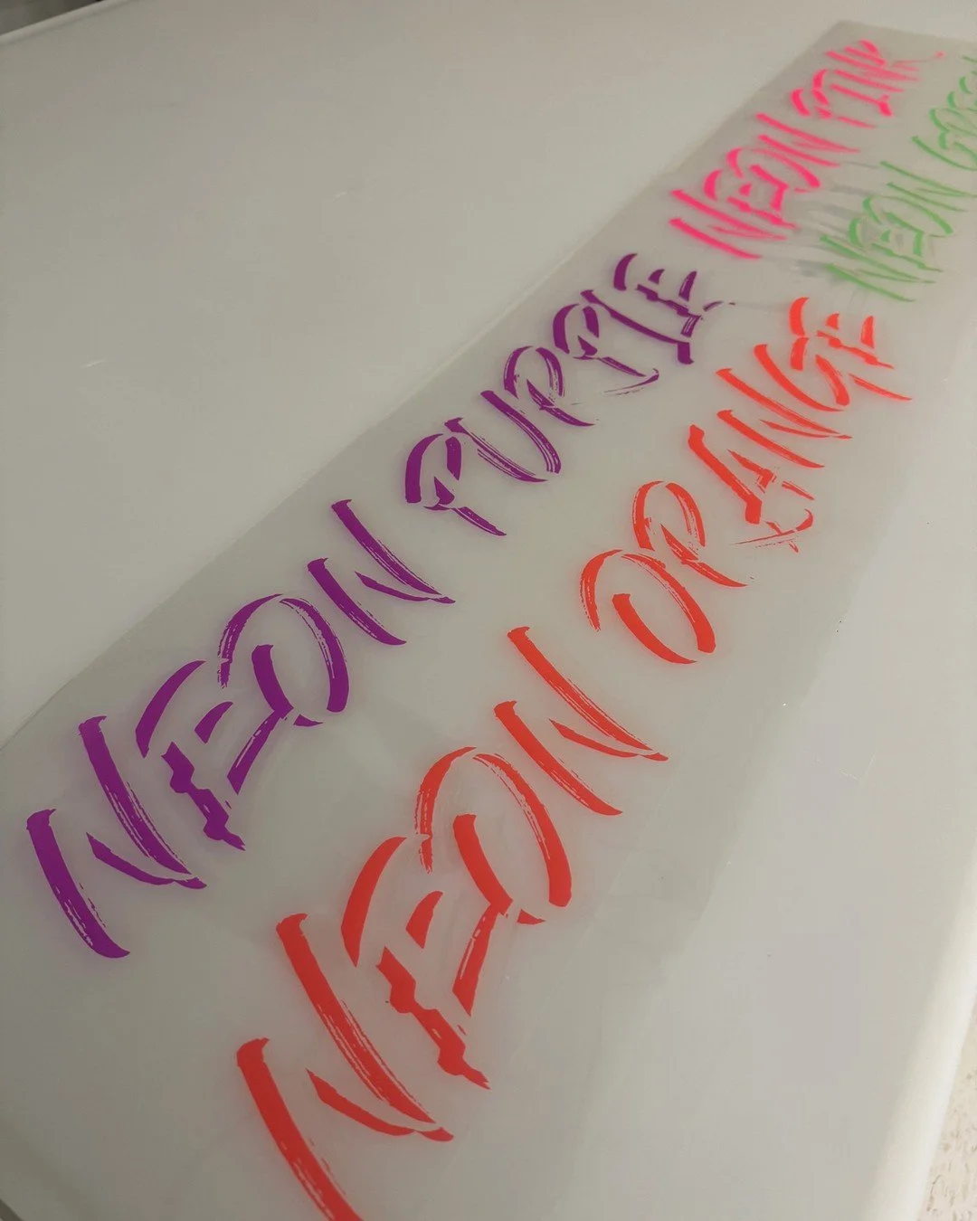 Orange is the color of Fall. Make your orange neon with SwissQprint.  Neon prints appear bright in light and glow in the dark. Swipe to see the same print in both. Neon prints work great for restaurants, nightclubs, entertainment venues, event graphi