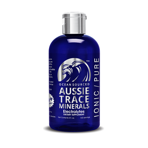 A blue bottle with silver text and silver cap on a white background. The primary text says "Ocean Sourced — Aussie Trace Minerals — Electrolytes."
