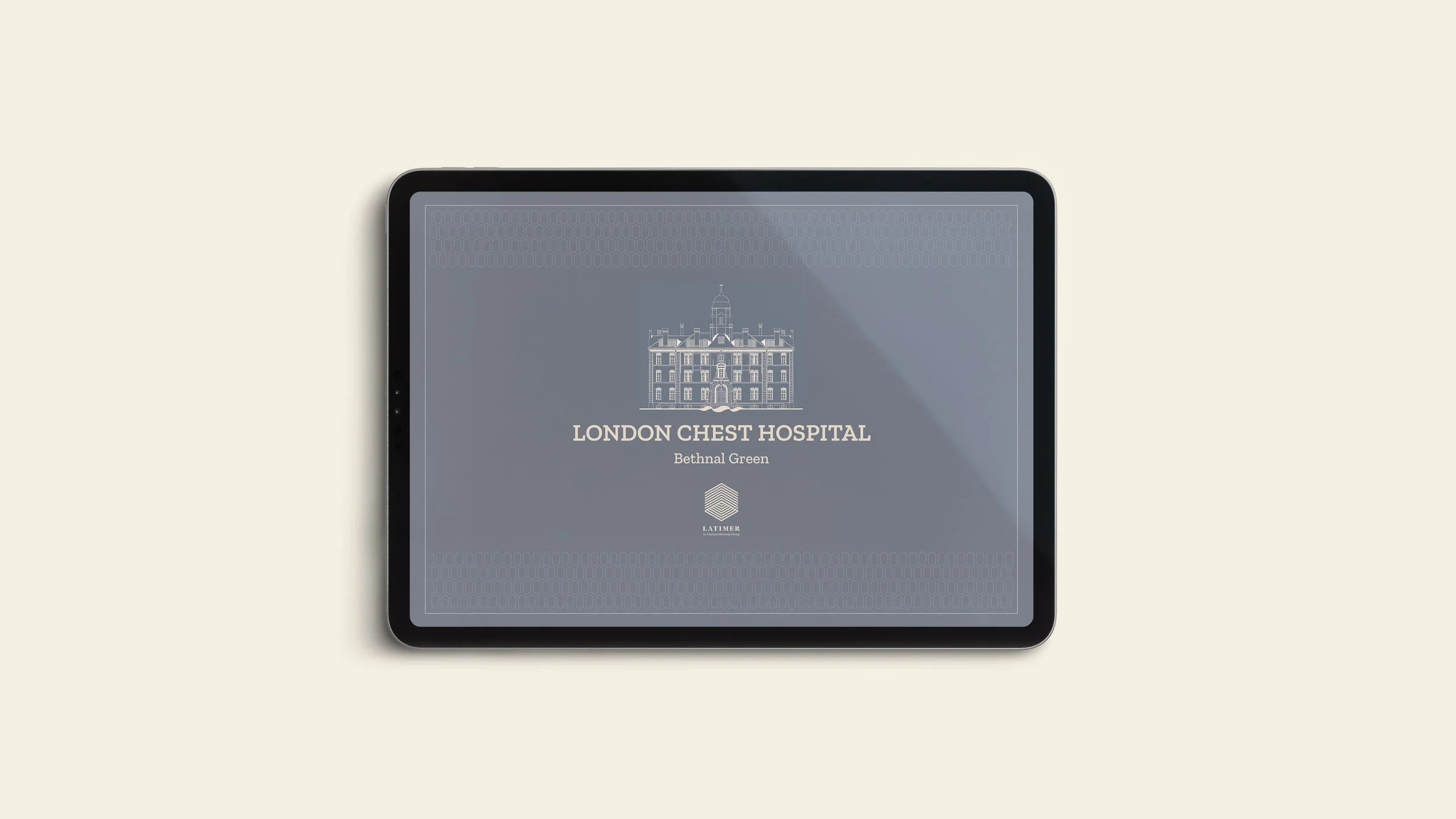 Tablet displaying logo and name of London Chest Hospital, Bethnal Green, with a detailed illustration of a historic building above the text.