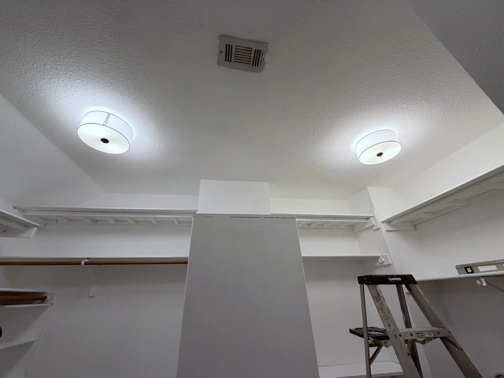 ceiling view with new closet lighting installed