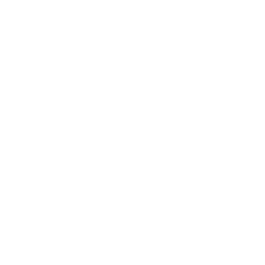 Close-up of a piece of paper with dark text or markings.