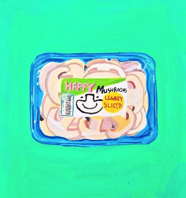 A blue plastic container filled with sliced mushrooms, labeled with a colorful sticker that says "HAPPY MUSHROOMS," "LEGALLY SLICED," and features a smiley face.
