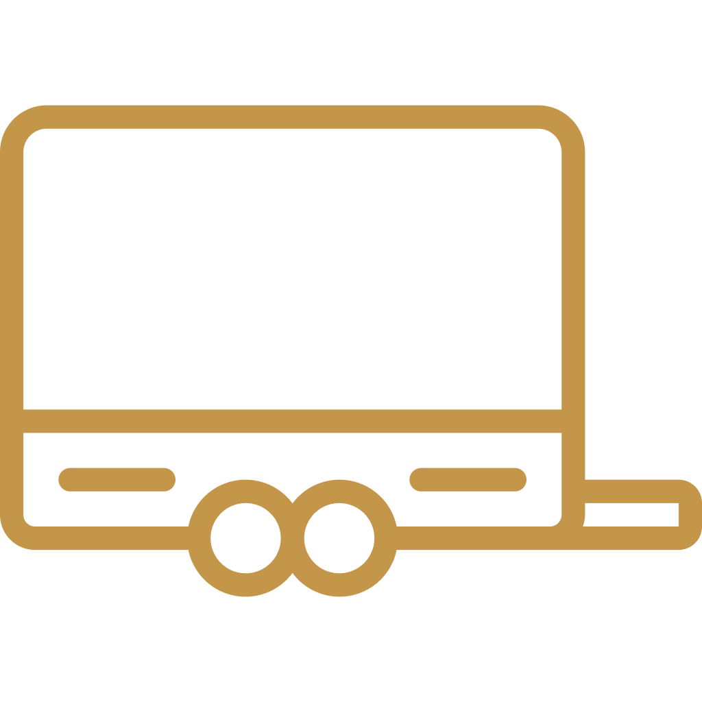 Outline drawing of a bus in a gold color on a black background.