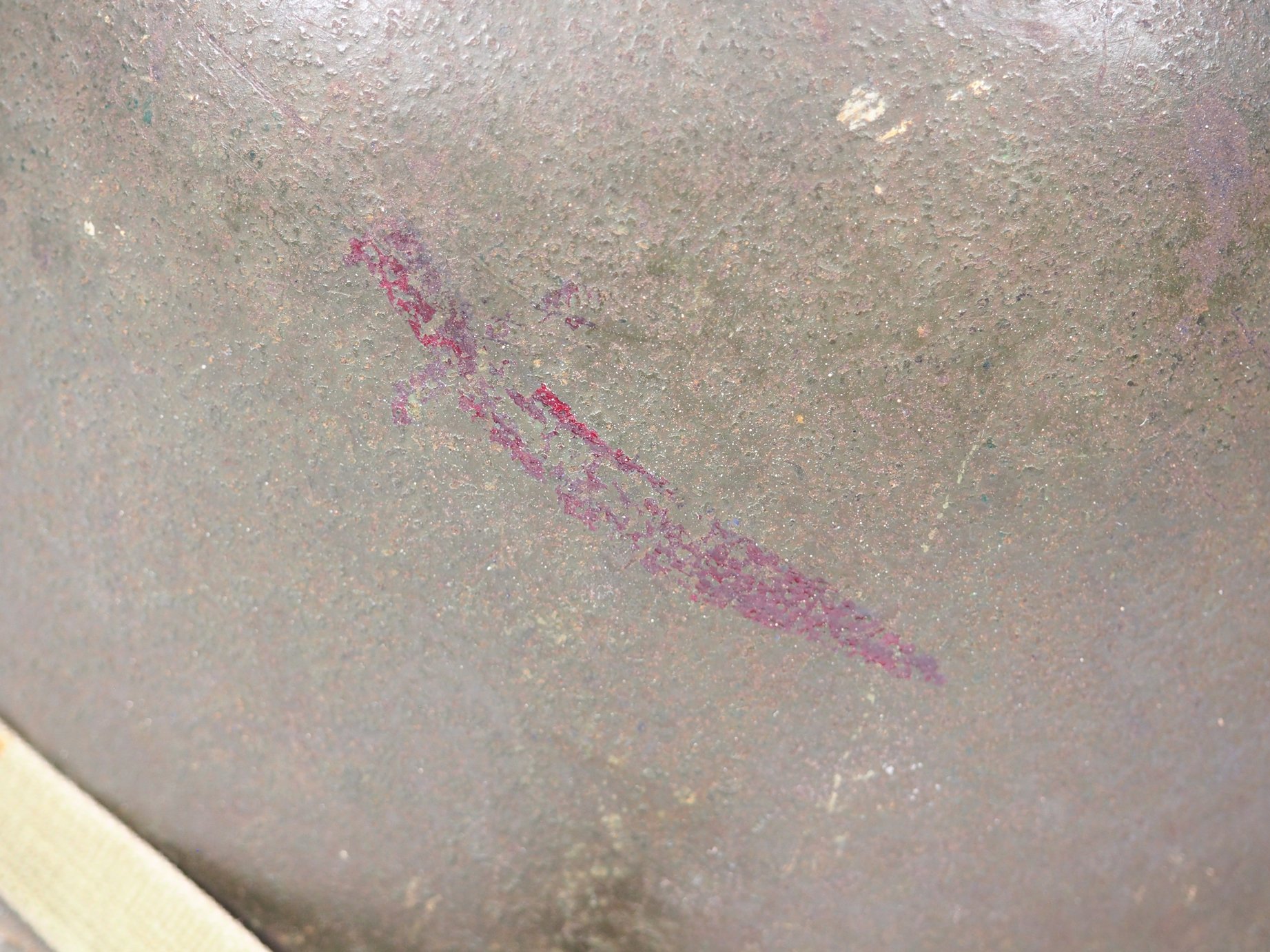 The unknown red sword marking on Nelson's helmet. It may not even be attributed to the 79th Infantry Division, as this helmet has had another owner in the past.