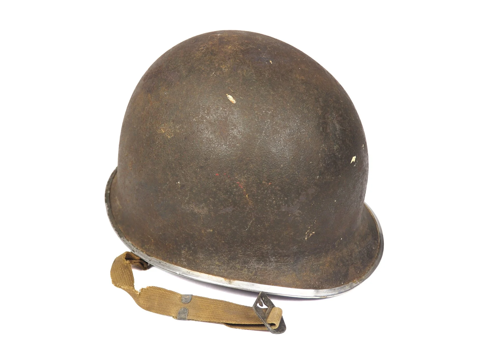 Unfortunately, this helmet was stored in a garage, and due to that, the condition is poor. There is almost no paint left on the shell, and one chinstrap has rotted away.