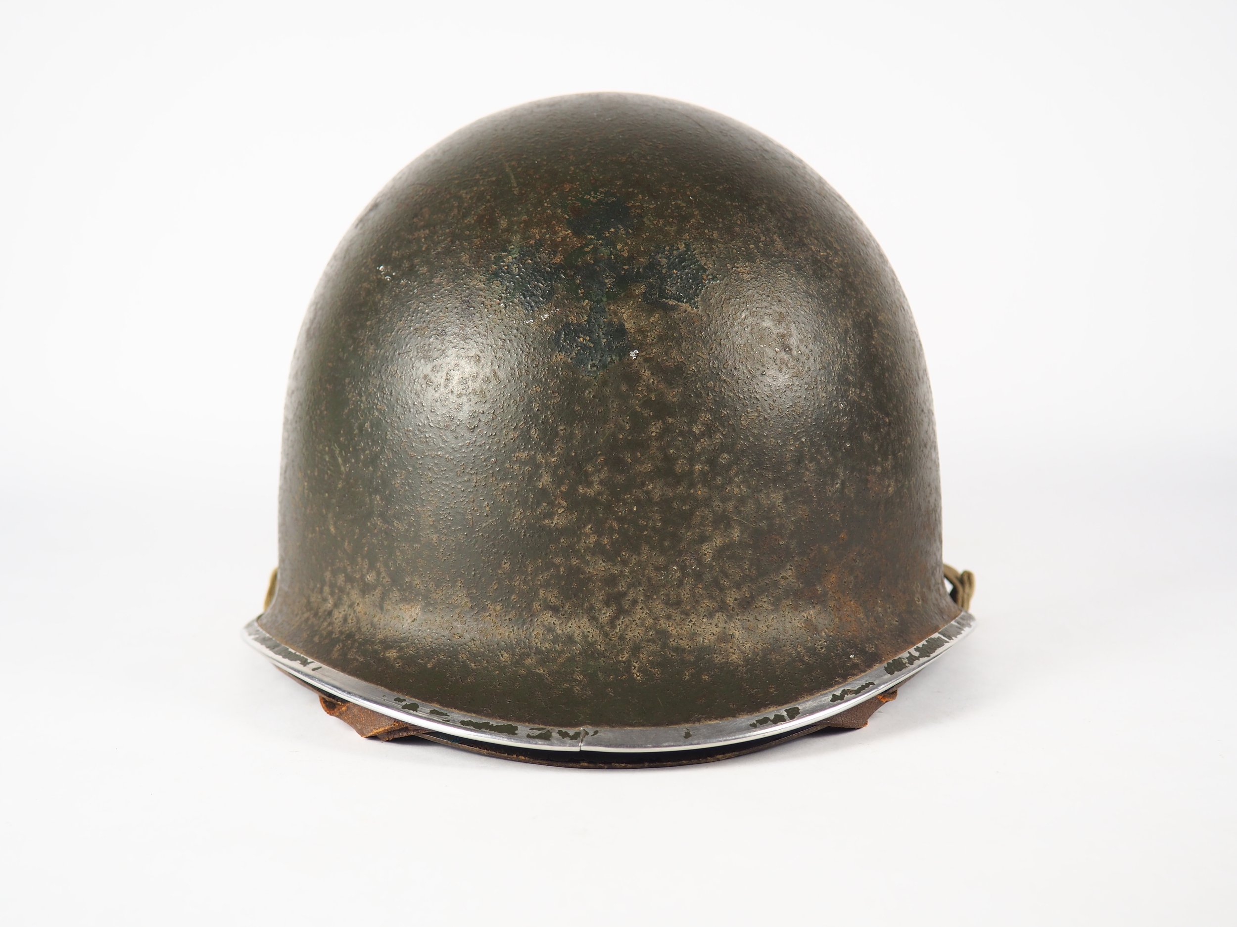 Contrary to popular belief, helmet repaints were often done with glossy paint, as seen in this example as well as others in the museum.