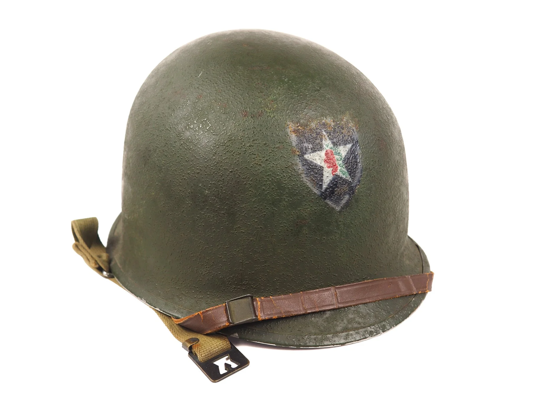 The 2nd Infantry Division began painting insignia on helmets for the Normandy Invasion and seemed to have only been used by those who originally landed on Omaha Beach D+1. These spray painted insignias were likely painted post World War II.