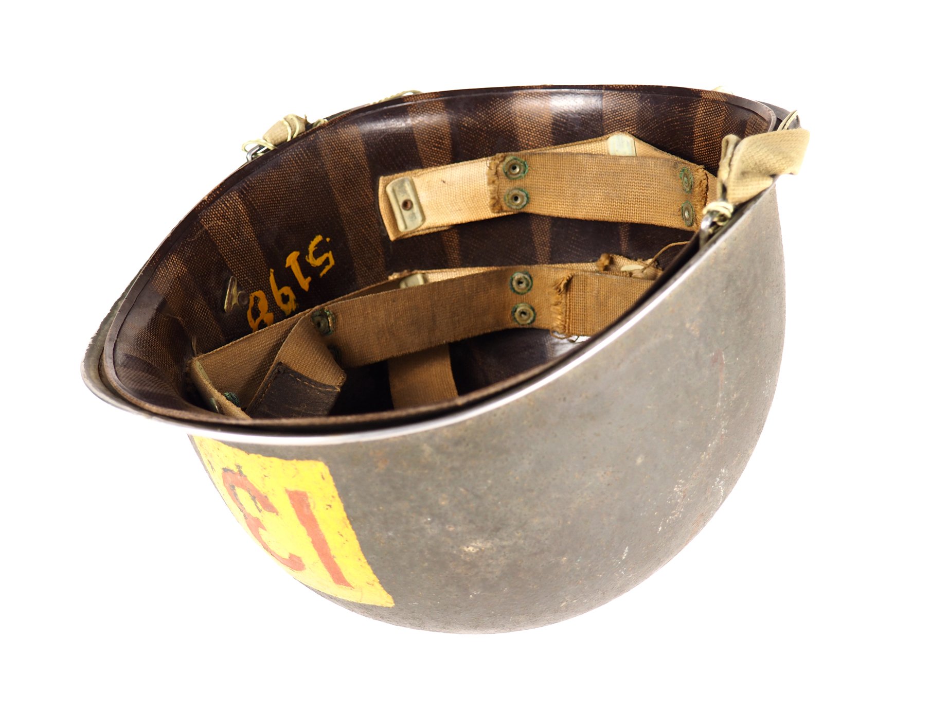 Schertzer's laundry number inside an early helmet liner fitted with rayon webbing, often associated with those who enlisted early in the war, or in Tec/5 Schertzer's case, pre-World War II.