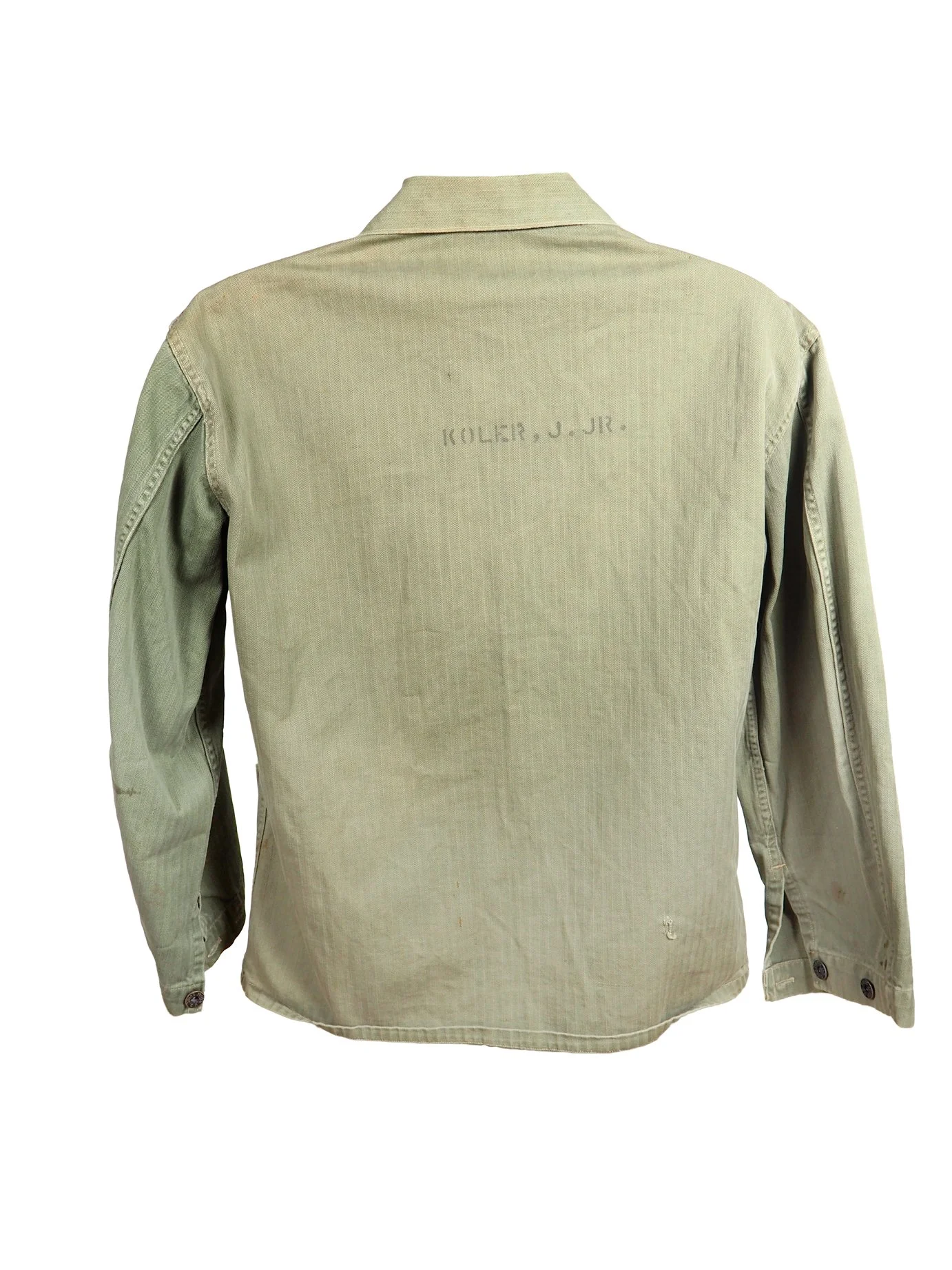 You may notice that the left sleeve of the jacket is a darker shade of green. That is not an error of the camera, these utility jackets were not perfectly made and often times, the fabric colors would mismatch on different parts.