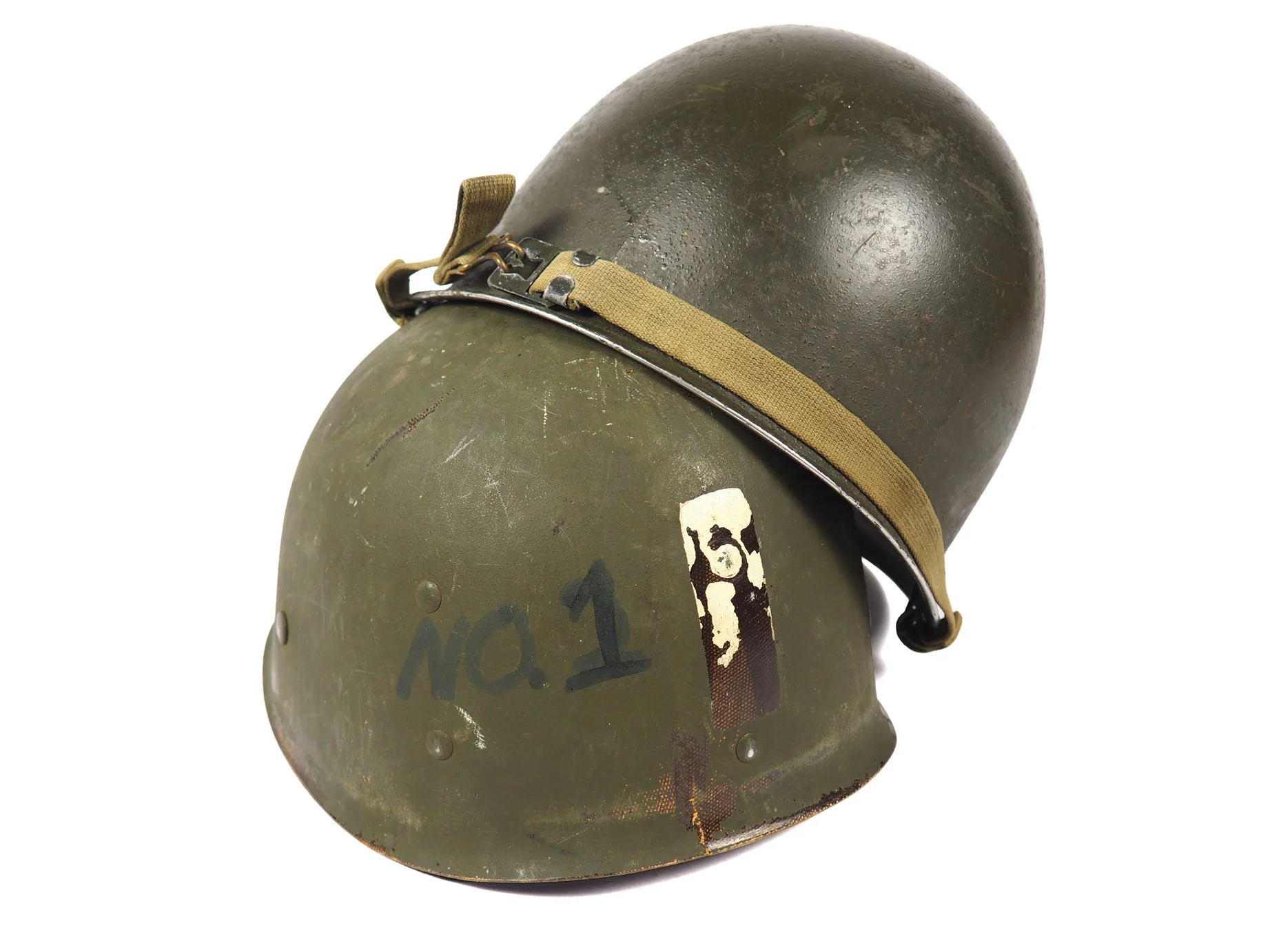 Captain Julien's helmet features a well-worn painted ETO Bar on the rear.