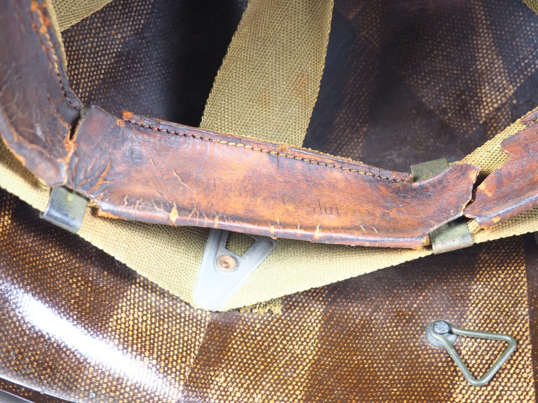 "Frank F. Julien" written on the sweatband.