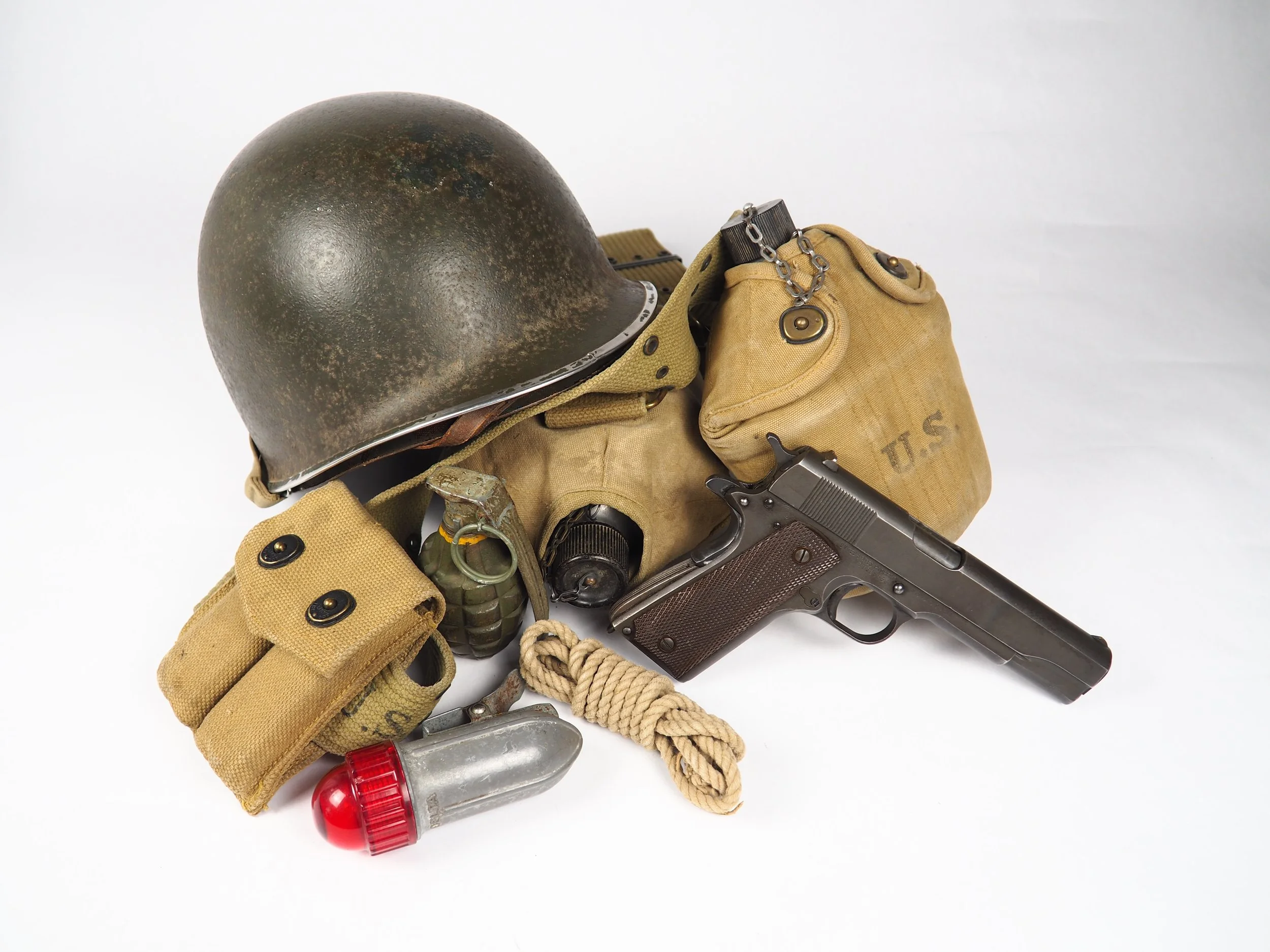 The red light and rope were two things that PFC Jones brought back in addition to the helmet - possibly things he used on the early morning hours of June 6, 1944.