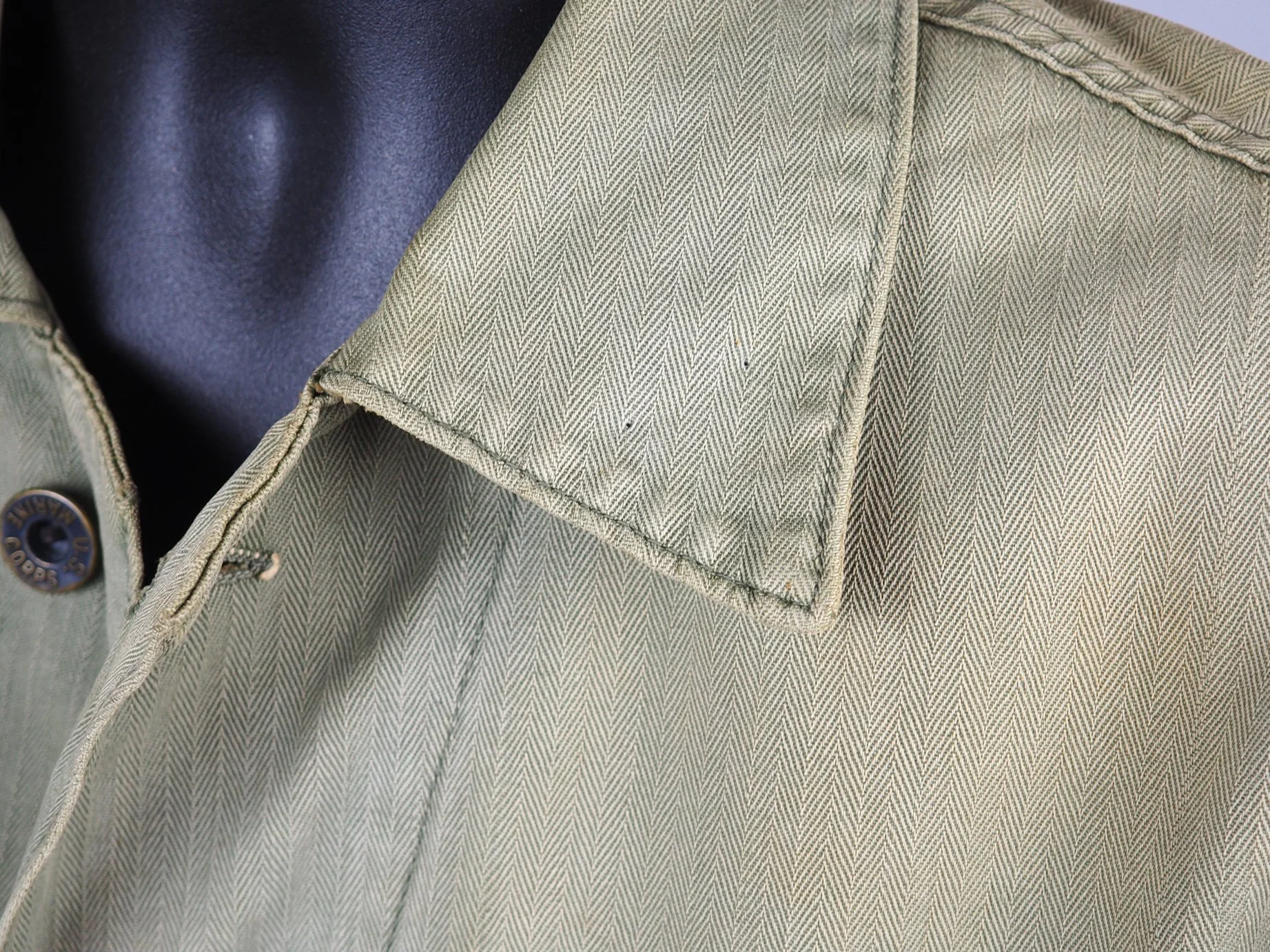 Formerly this jacket had Private First Class insignia attached.